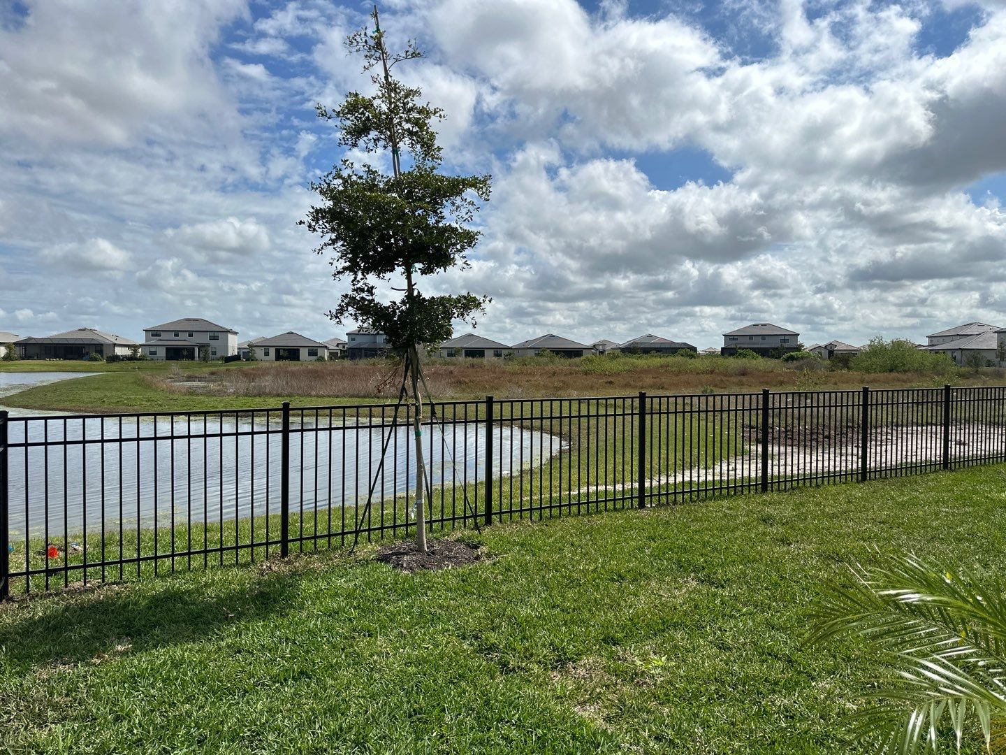 Aluminum Fence Installation using Black 3 Rail Aluminum Fence by Asap fence and gates, LLC
