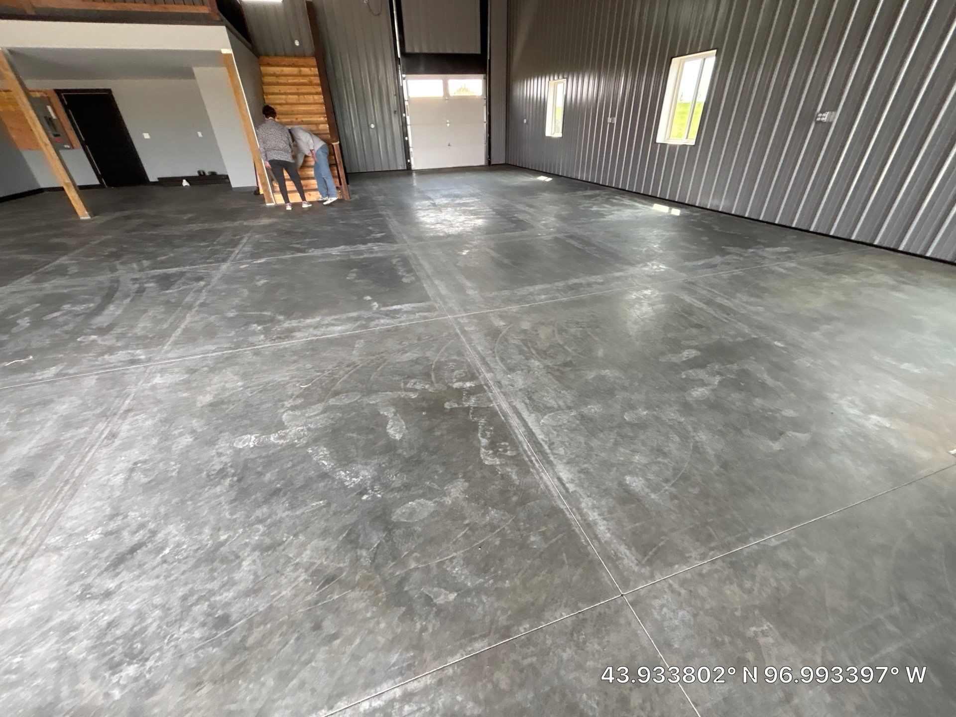 Polyaspartic Garage Floor Coating with Decorative Flake in Wentworth by Select Painting, Coatings & Garage Cabinets