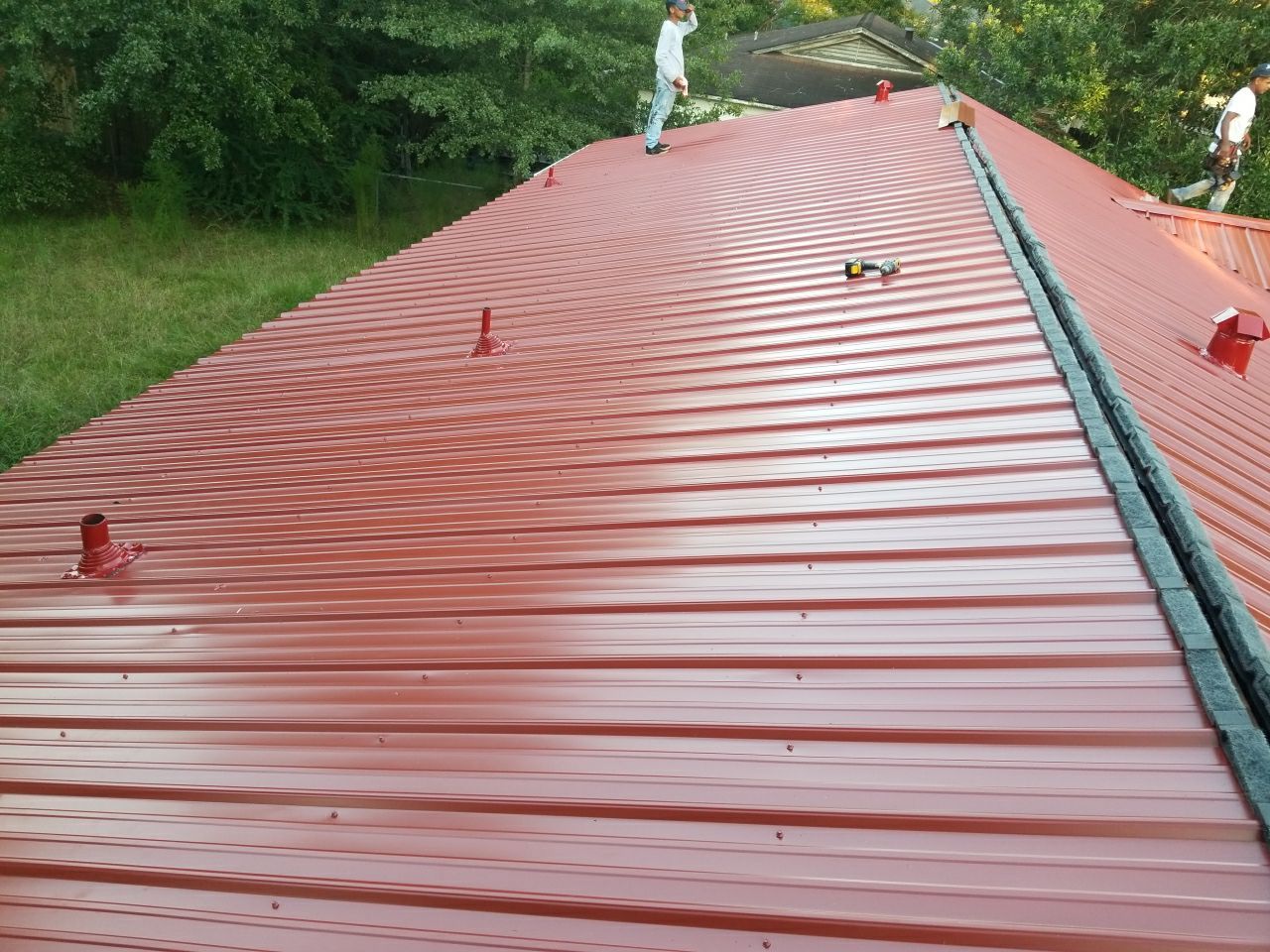 Residential Roofing Installation using Metal roofing by American Roofing & Construction LLC