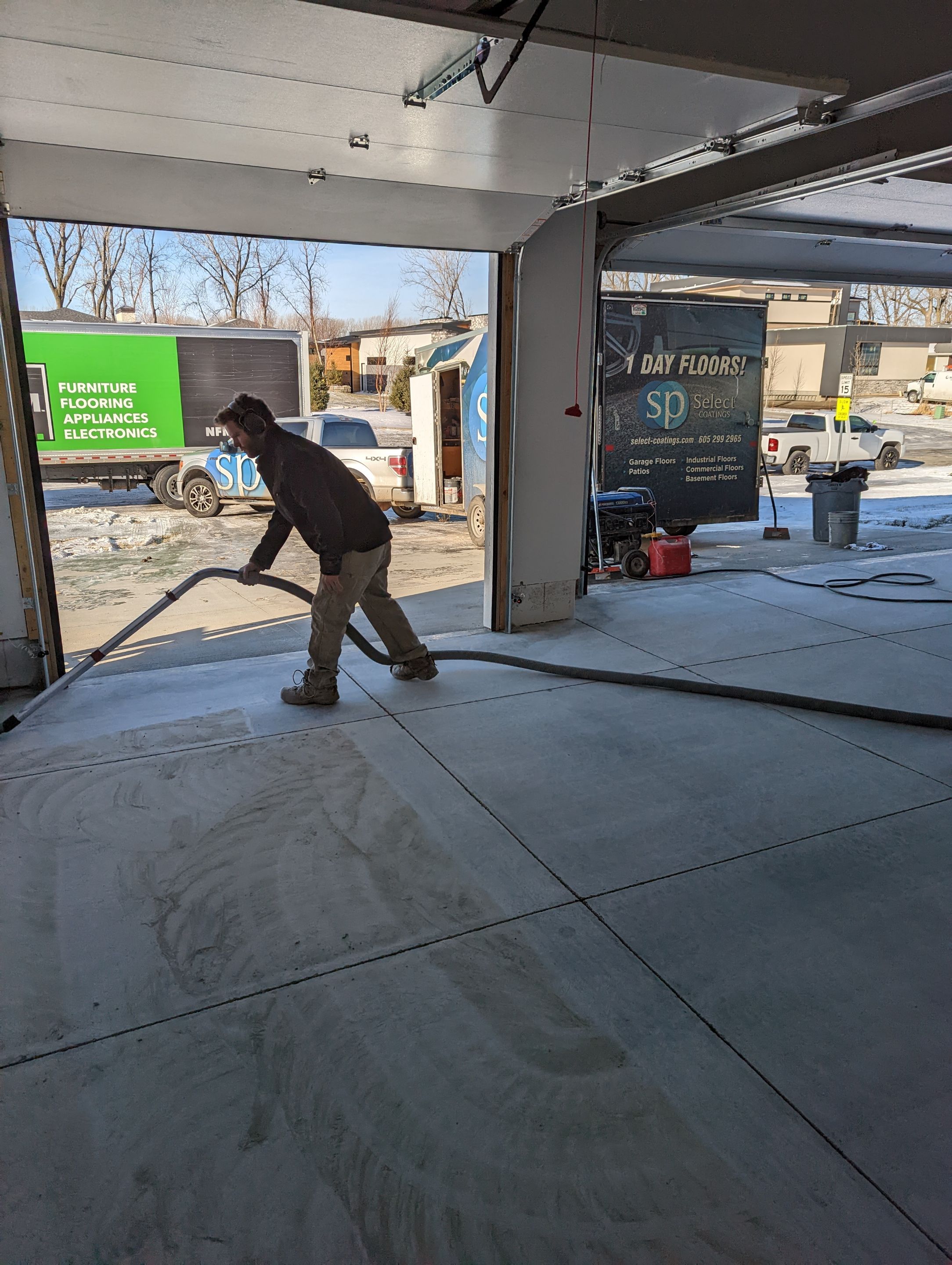 Garage using Sandstone by Select Painting, Coatings & Garage Cabinets
