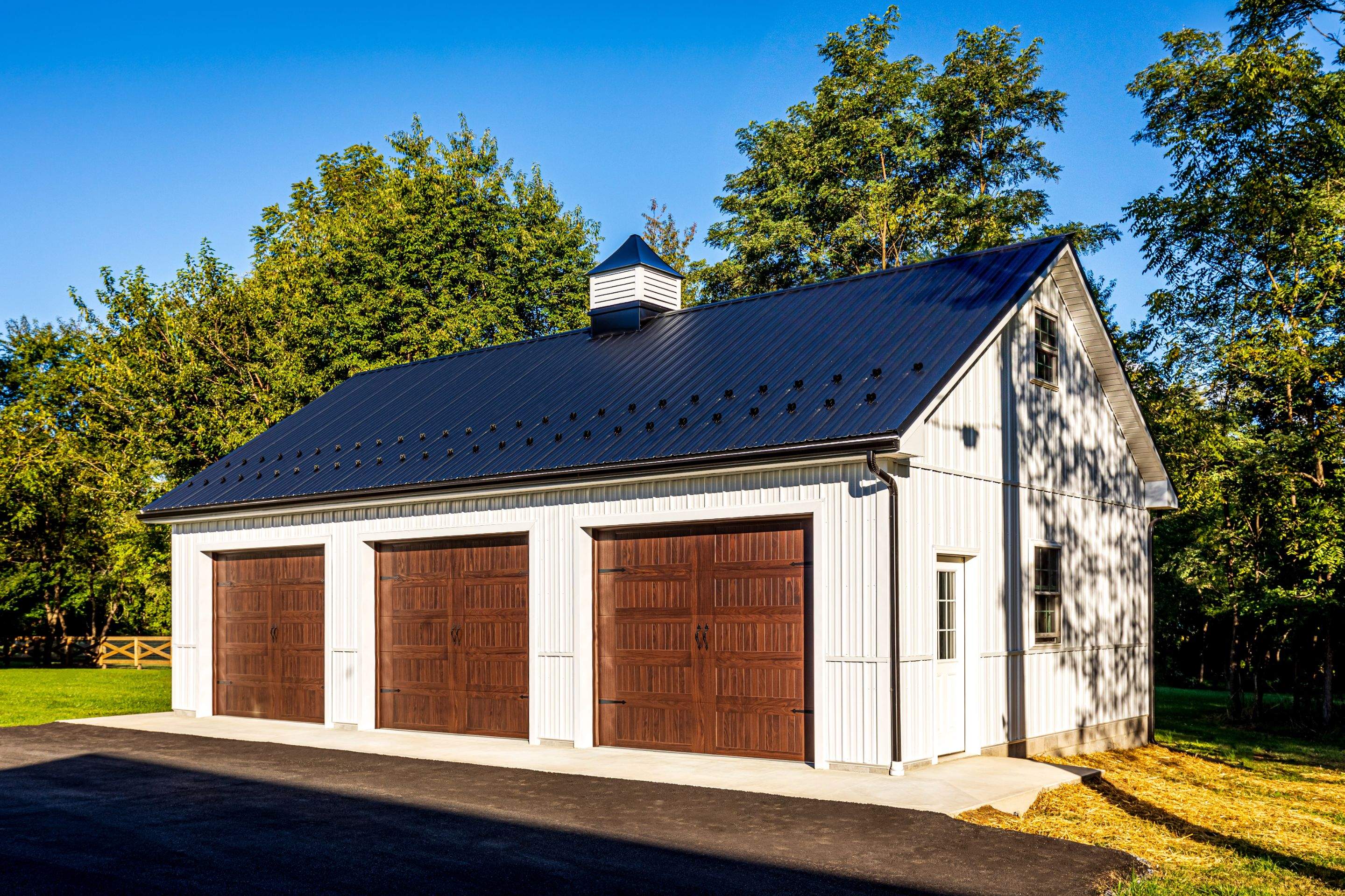 Metal Roof-black New Garage by Esh Builders