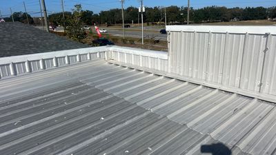 Silicone Roof Restoration for Commercial Metal Building in Lutz