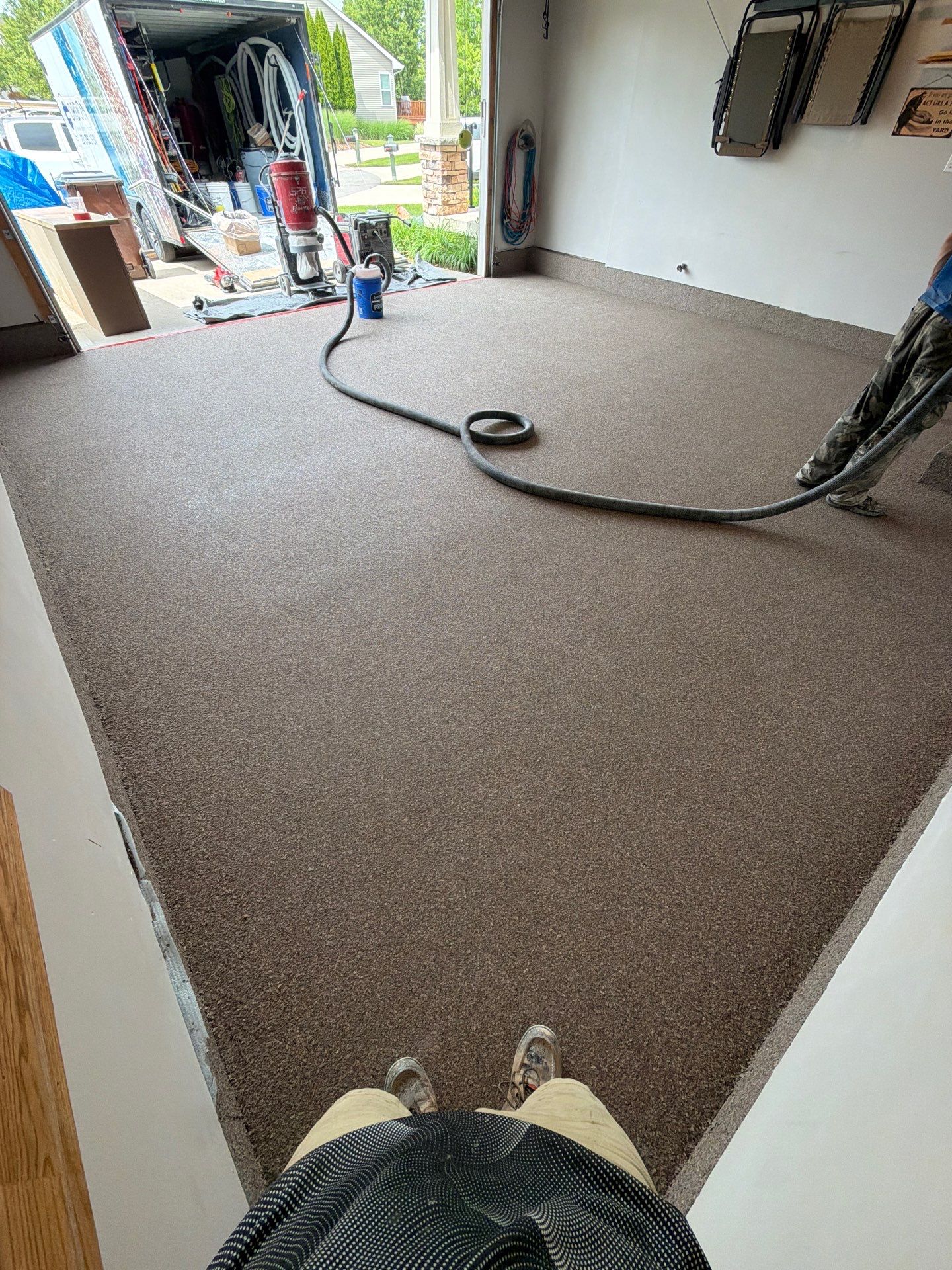 Garnet Polyaspartic Flake Garage Floor Installation in Zeeland by Gordon Painting