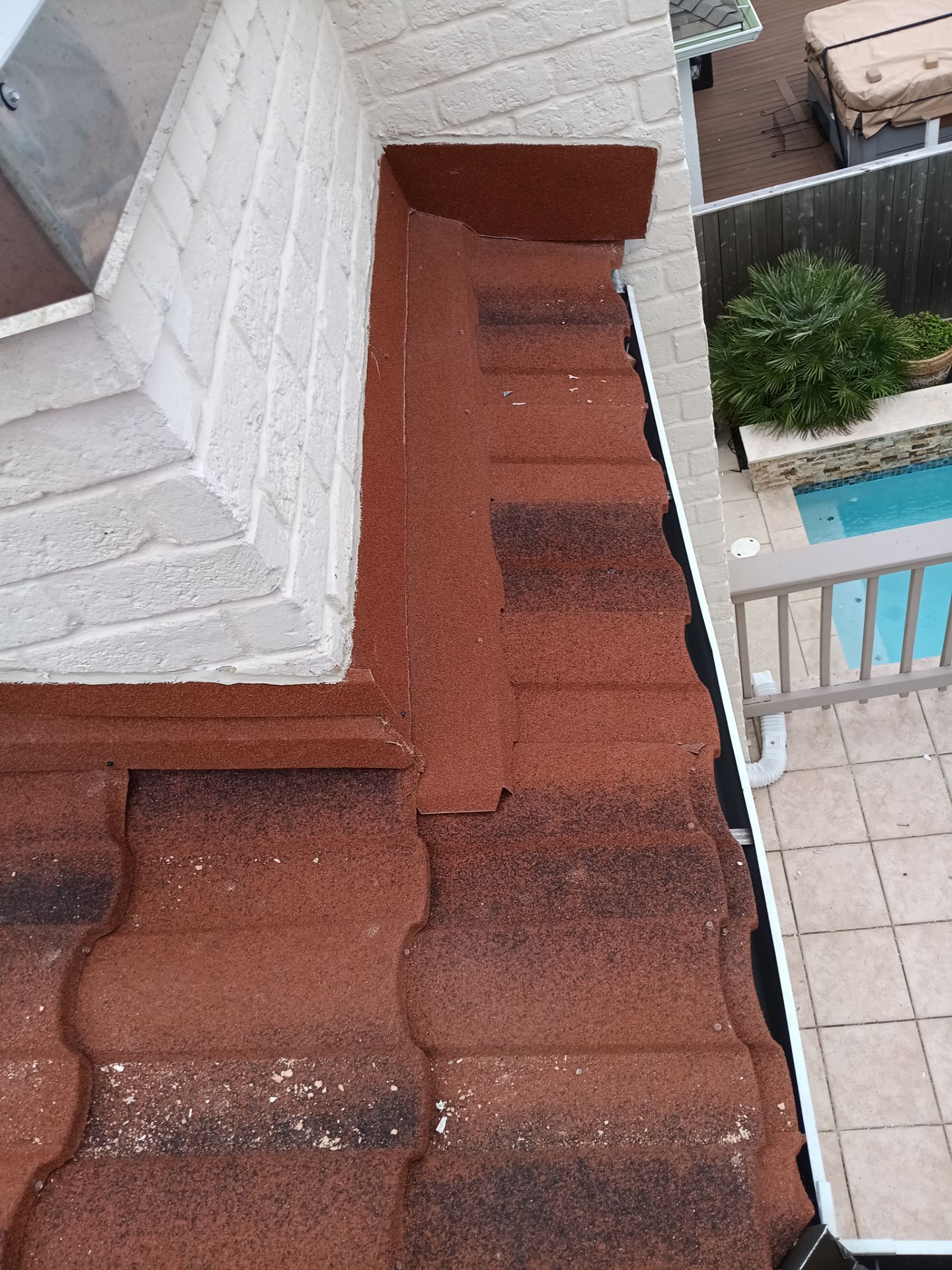 Off with the Tile and on with the TILCOR stone coated metal.  by Bayfront Roofing and Construction