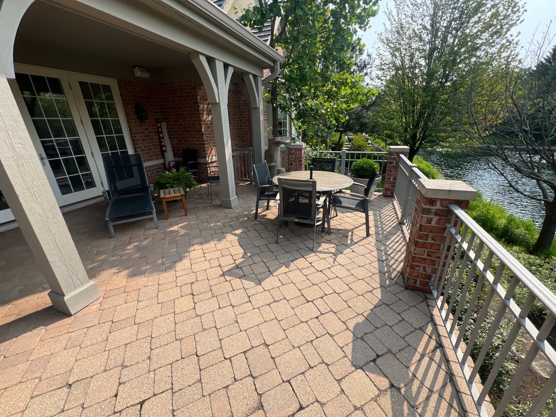 Brick paver cleaning sanding and sealing by Northern Power Washing LLC.