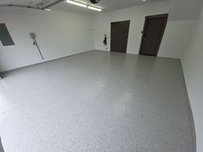 Garage and Porch Concrete Floor Transformation in Rathdrum