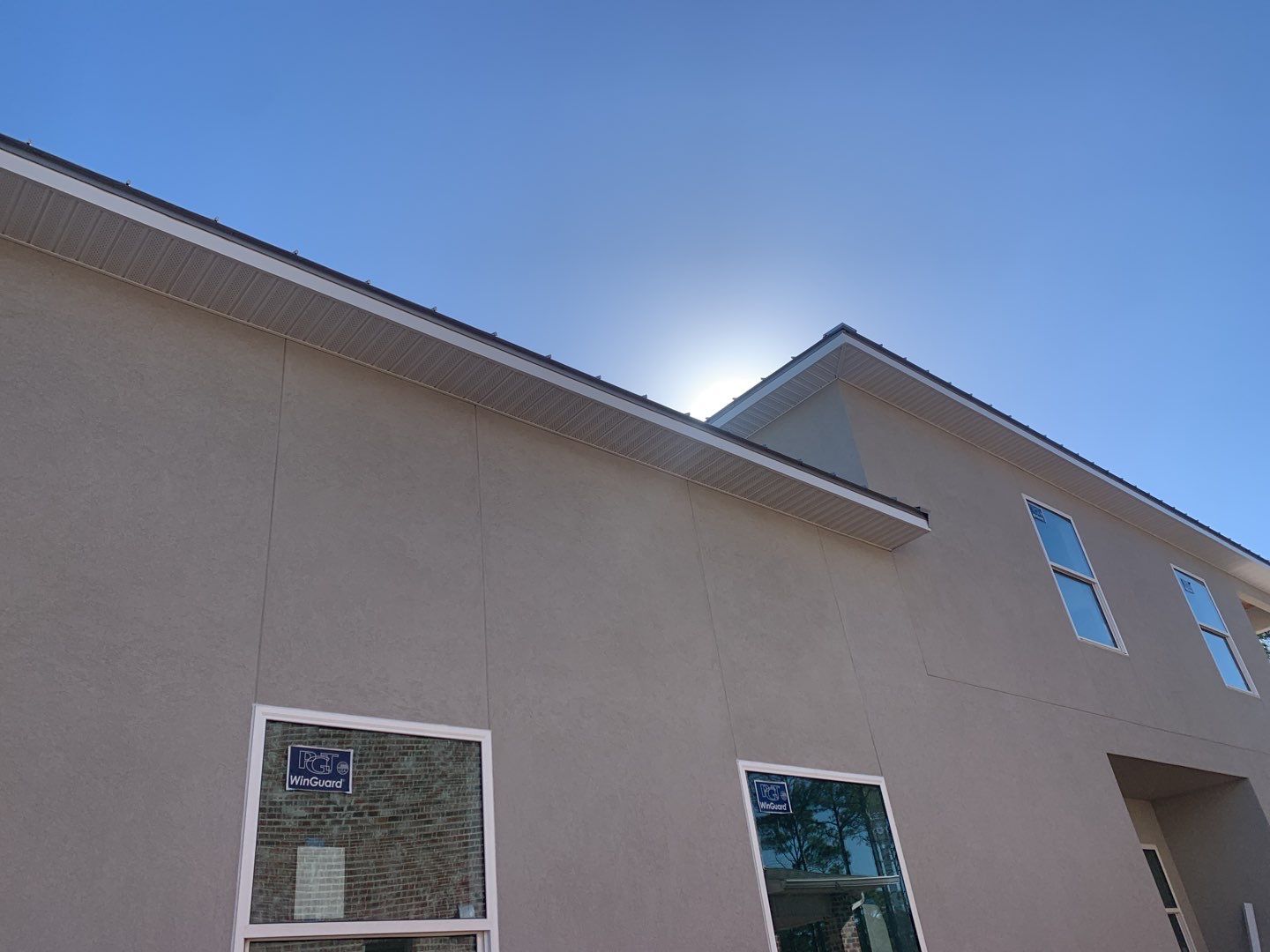 Soffit and Fascia Installation using White Vinyl Soffit in Pensacola FL by Gutter Professors