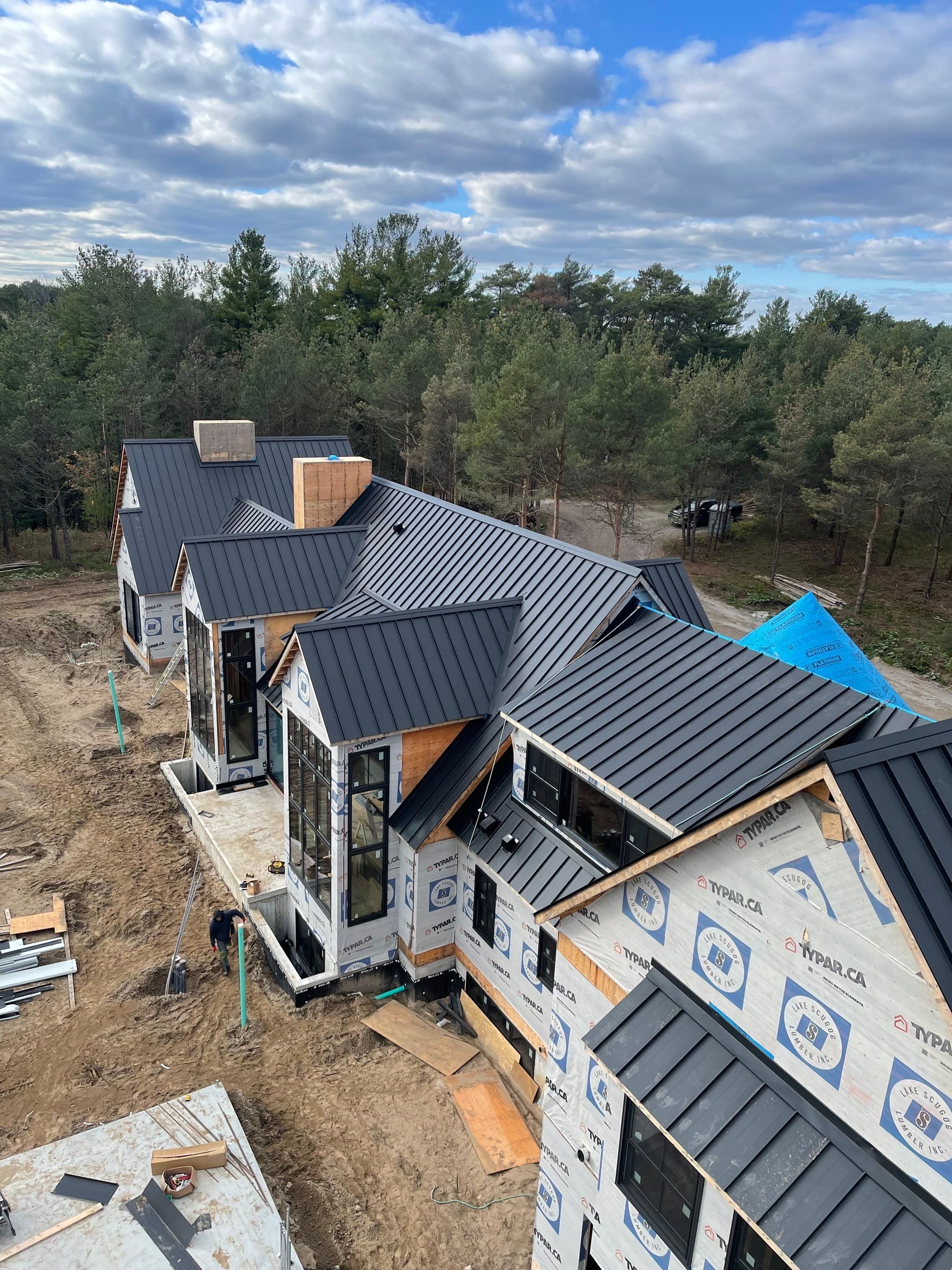 New Home Construction using 16" Standing Seam Panels by Jay Carter Roofing & Sheet Metal
