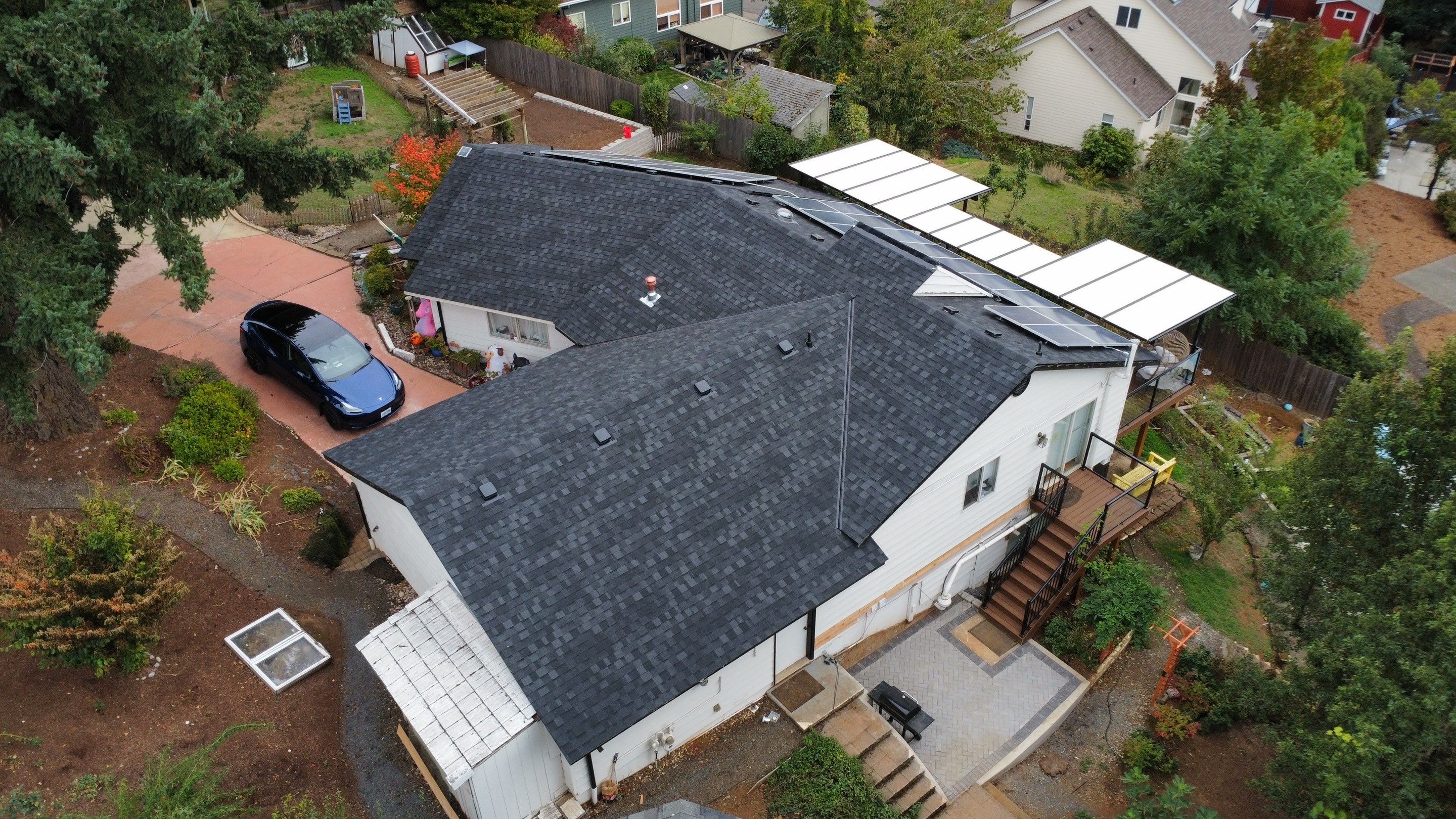 Granite Black Residential Roof Replacement by Orezona Building & Roofing Company, Inc.