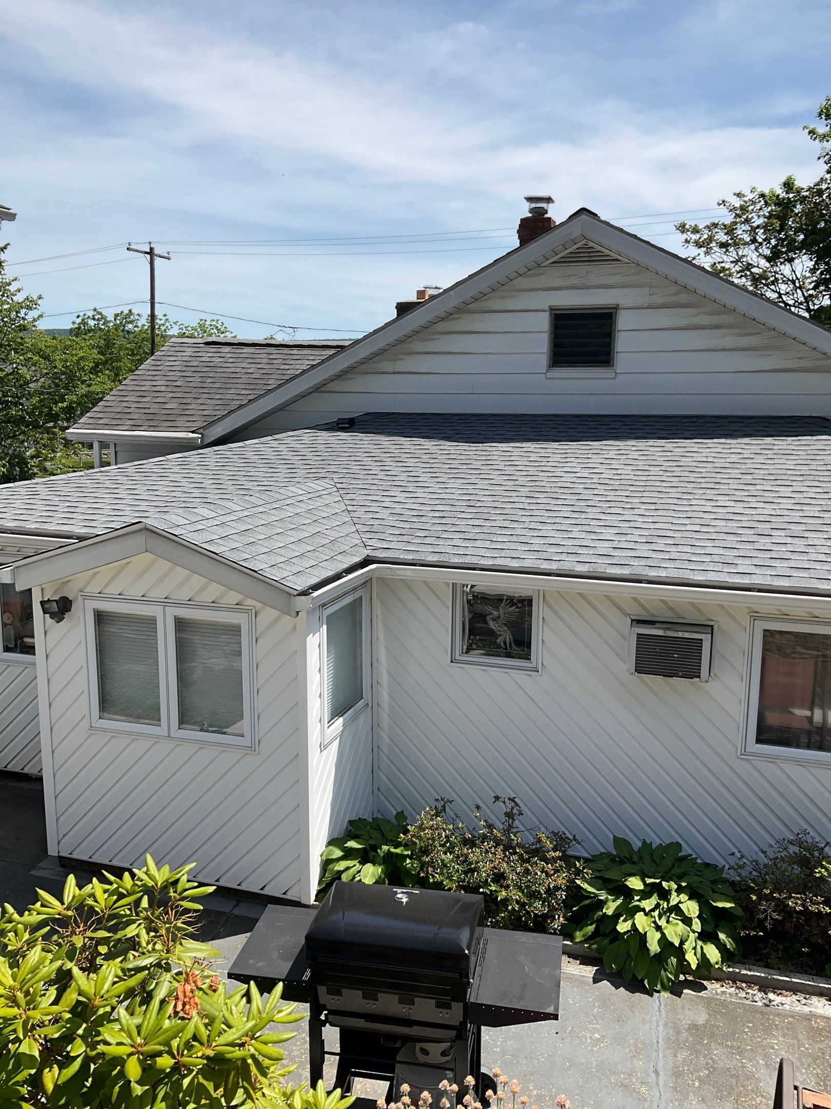 Shingle Roof Replacement and Seamless Gutter Installation in Lavelle by Esh Builders