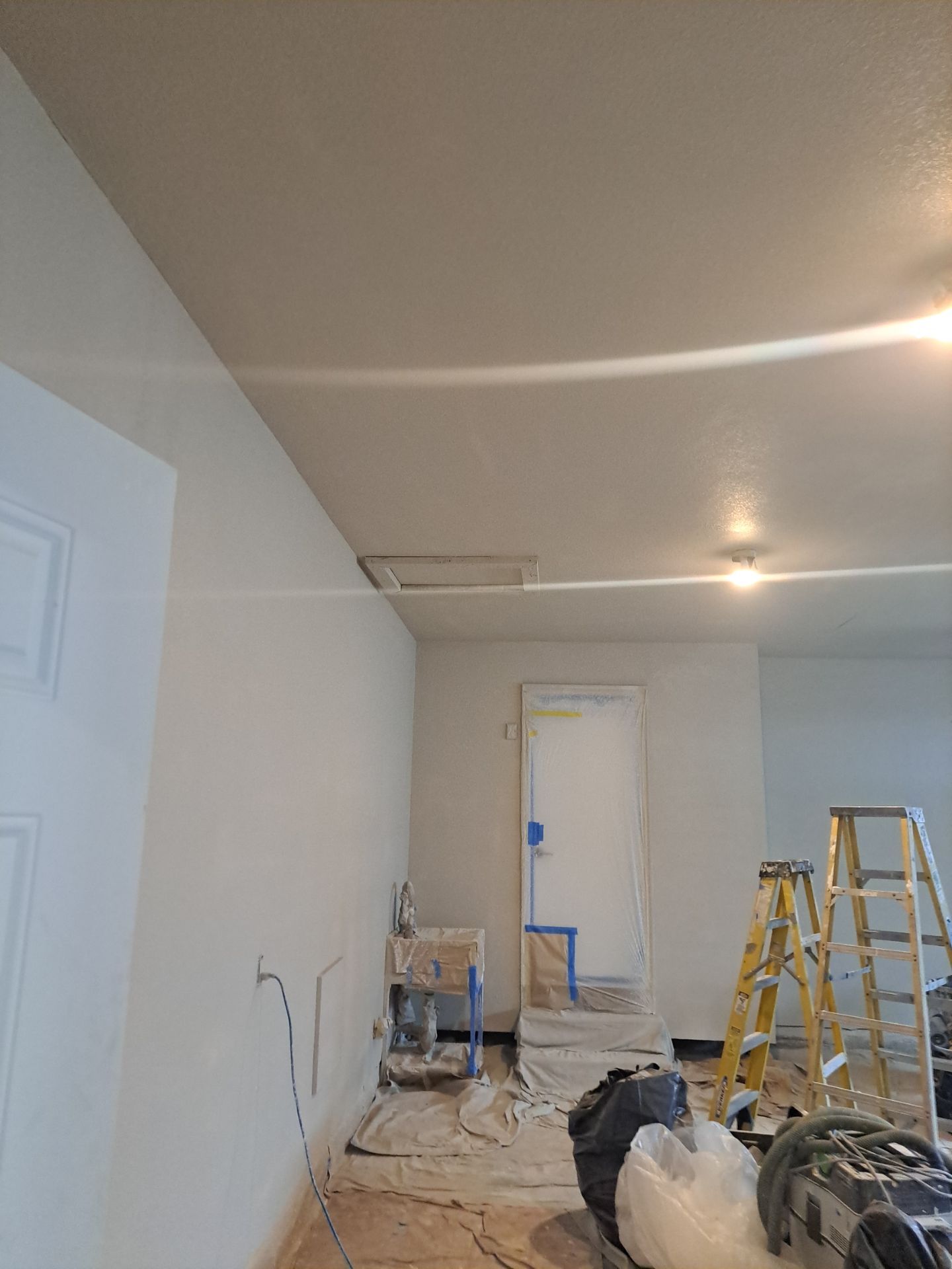 Garage dry wall repair/ re-texture, re-paint by Gordon Painting