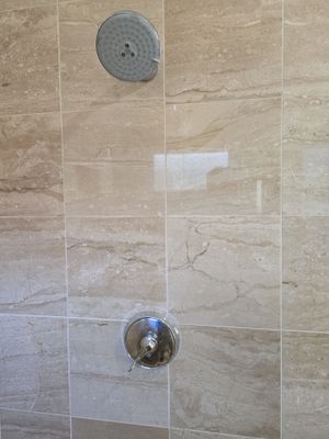Installation of New Shower Fixtures, Sink, Dishwasher, Plumbing, and Pipes