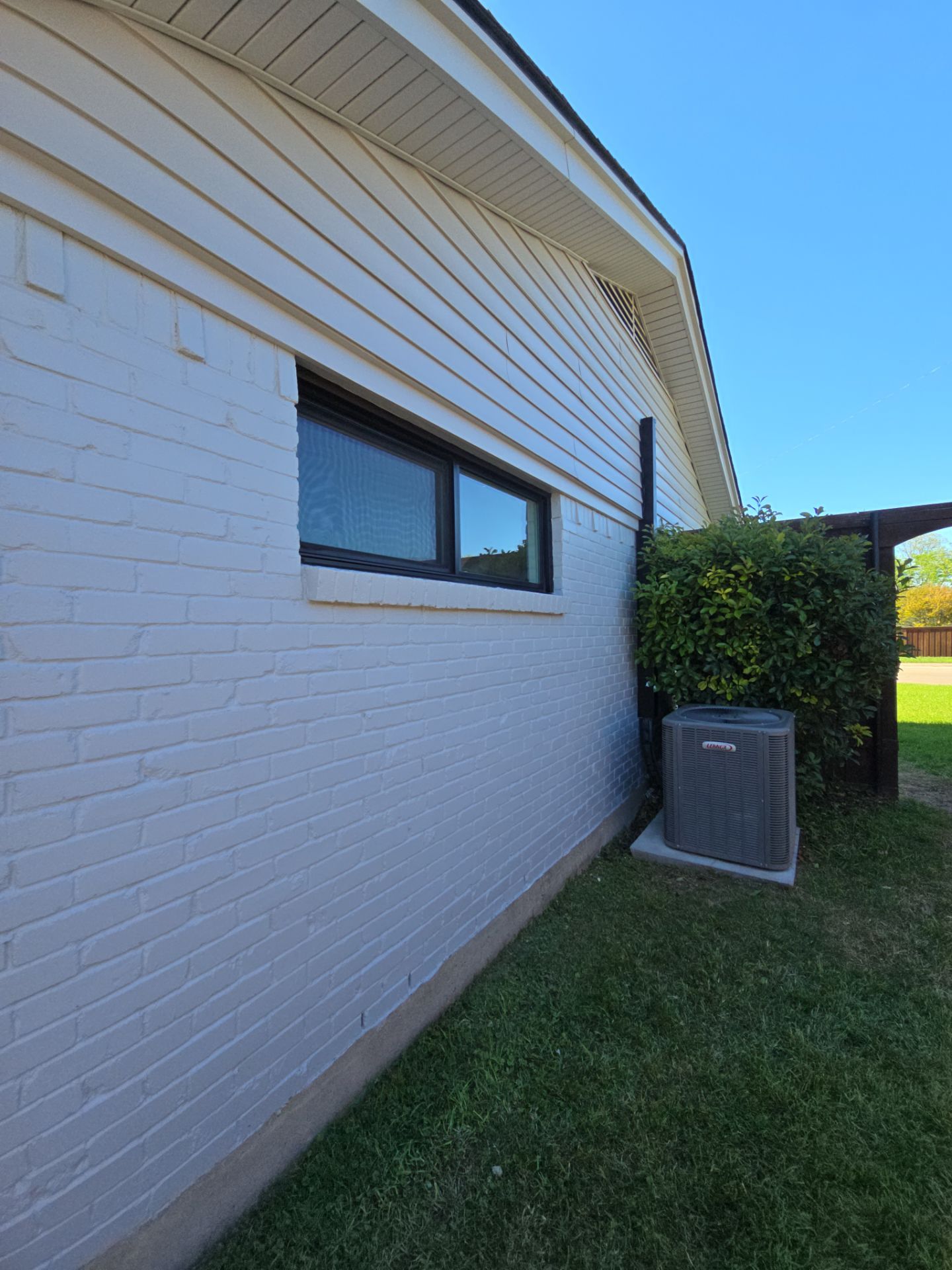 Exterior Home Paint Project with Different Surfaces by SLM General Contractors & Roofing