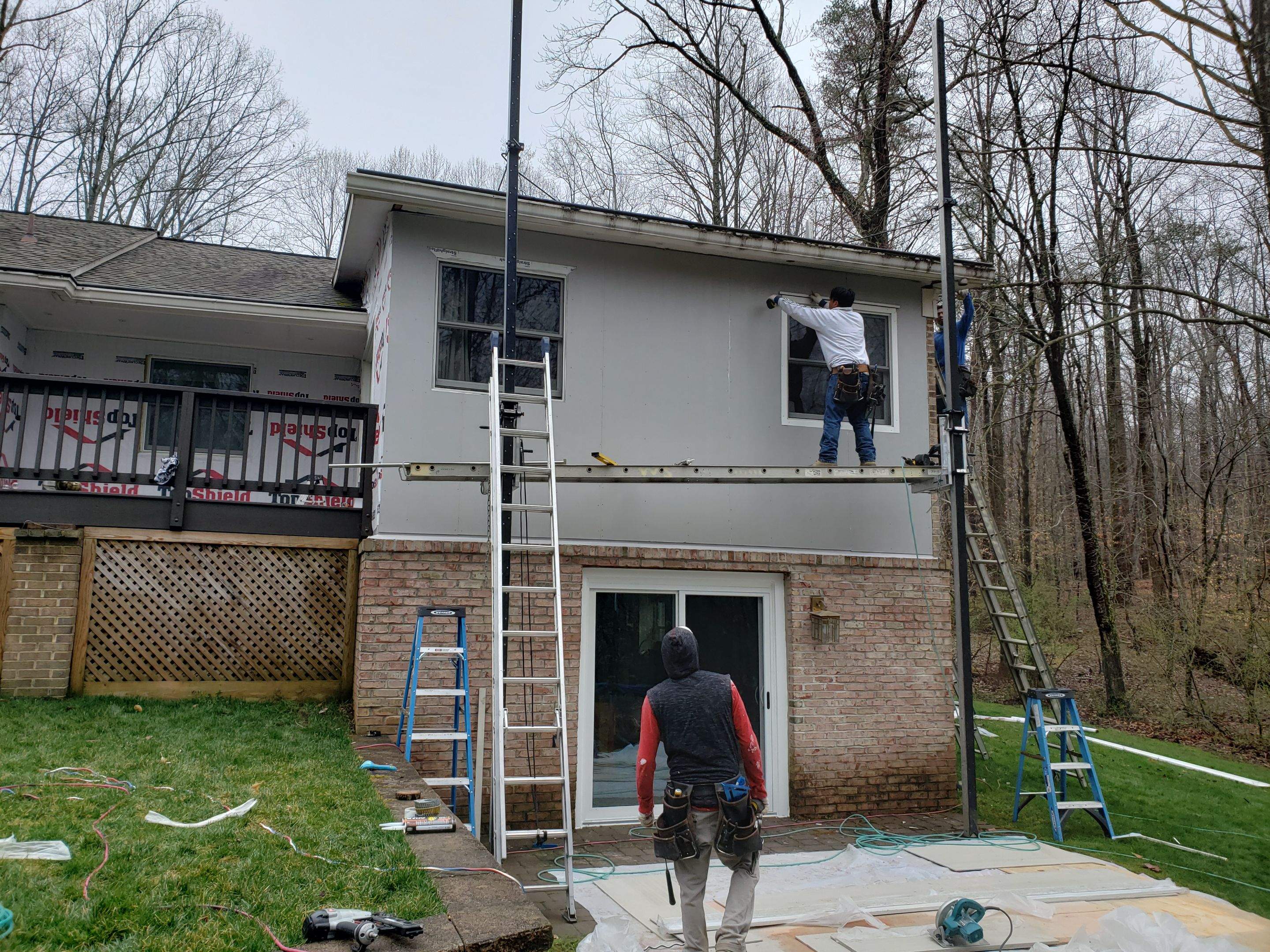 Roof, Siding, Door, and gutter replacement by American Home Contractors