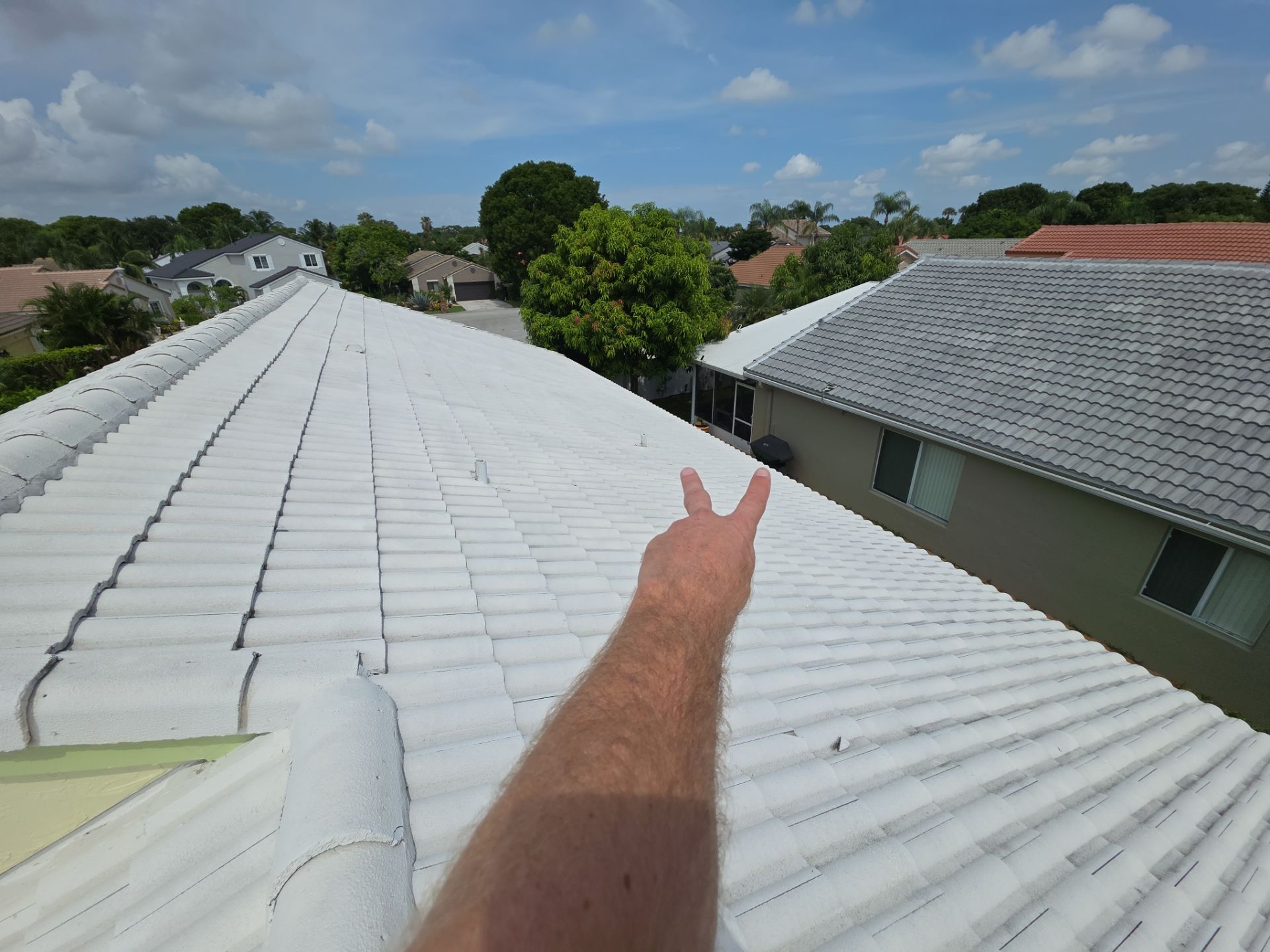 Concrete Tile Roof Repair and Wood Fascia Restoration in Deerfield Beach by Aastro Roofing