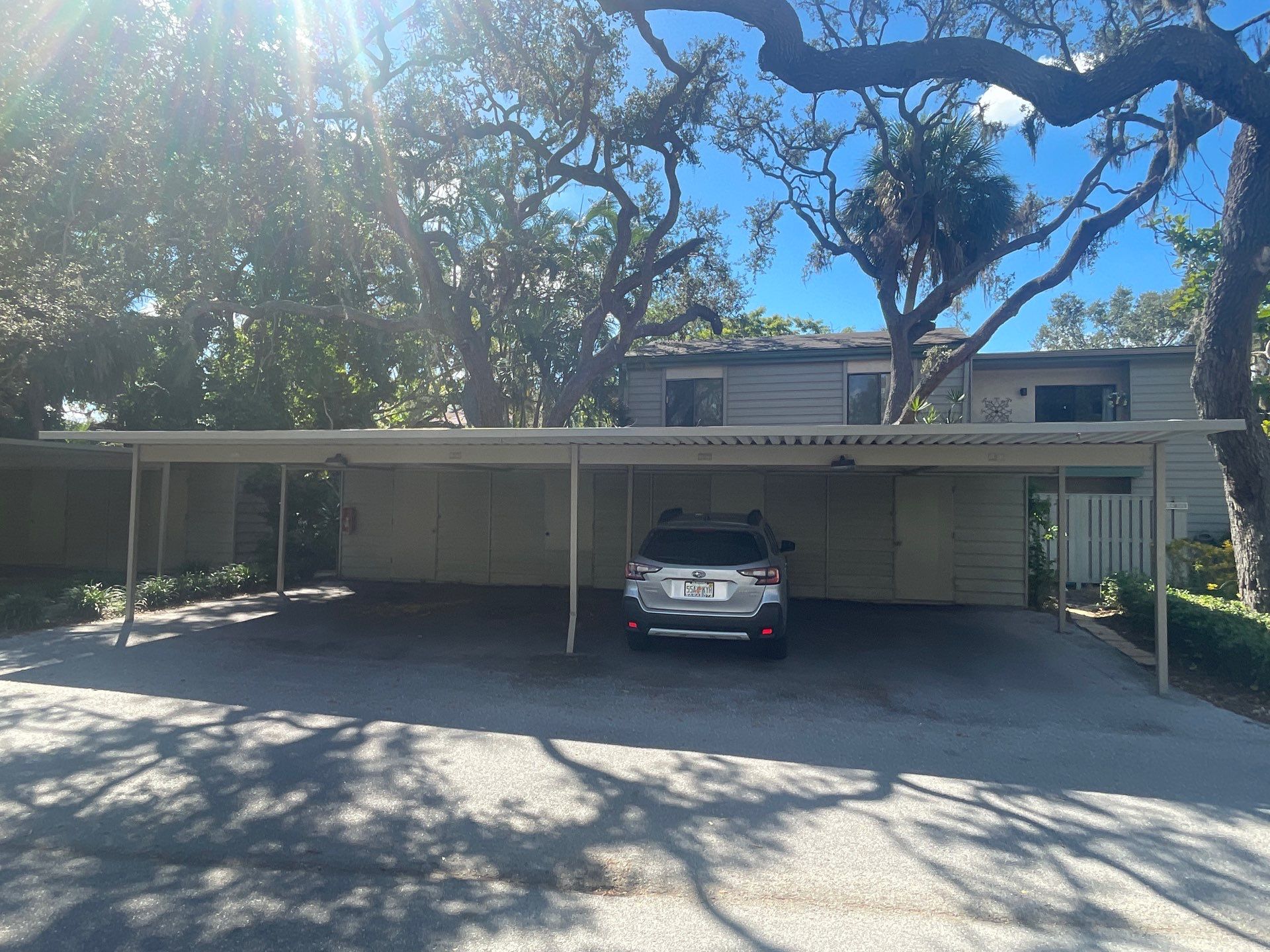 Clean Gutters and Roof in Sarasota FL by Gutter Professors