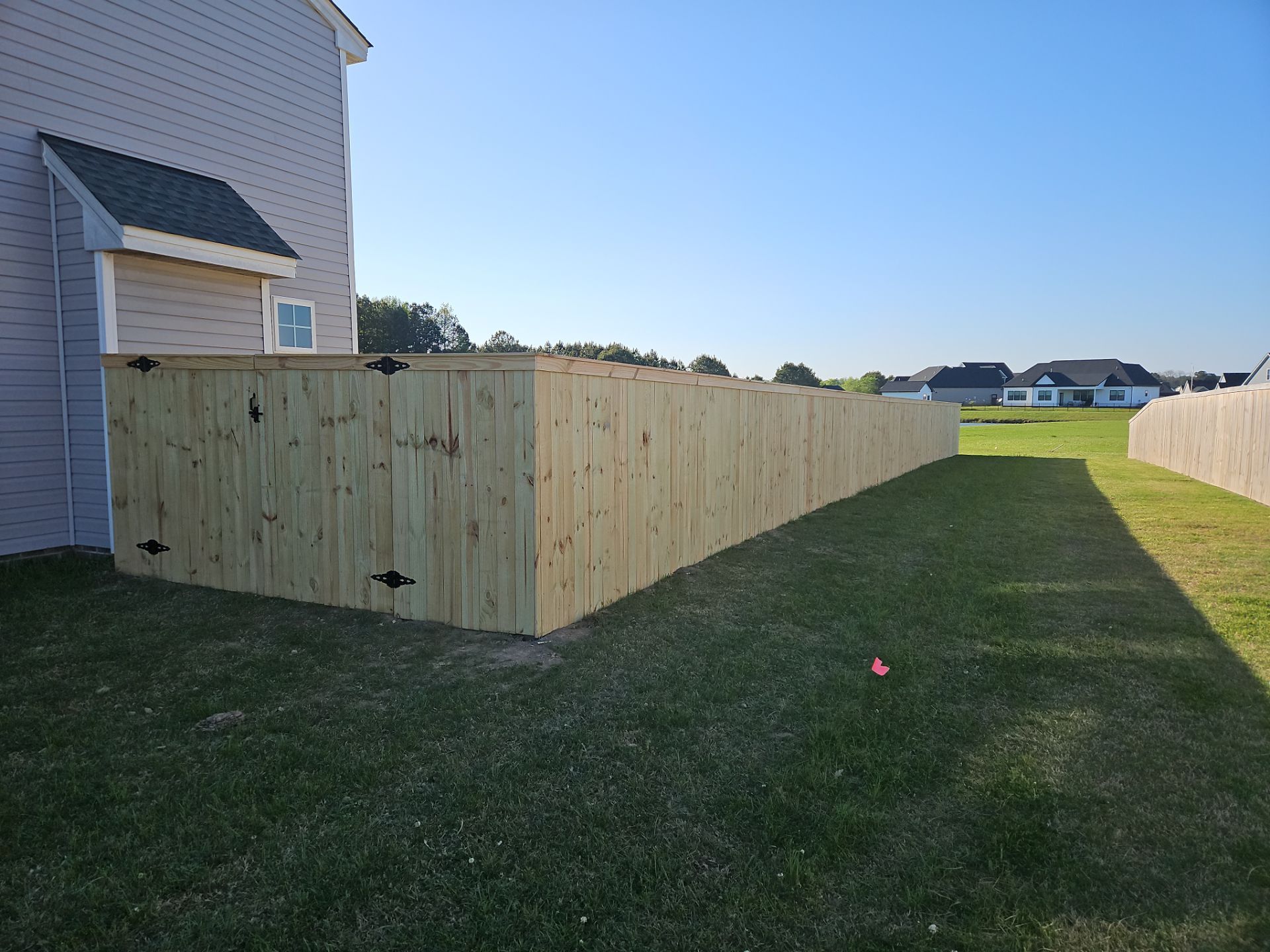 Stronger. Sleeker. Wood. by Tidewater Fence
