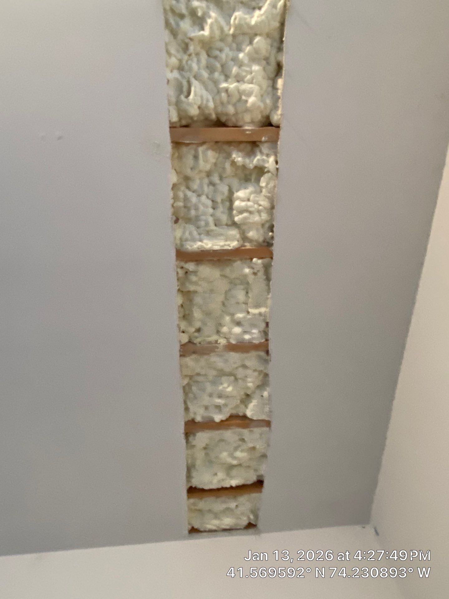 Garage ceiling using open cell spray foam by NYS Foam & Energy