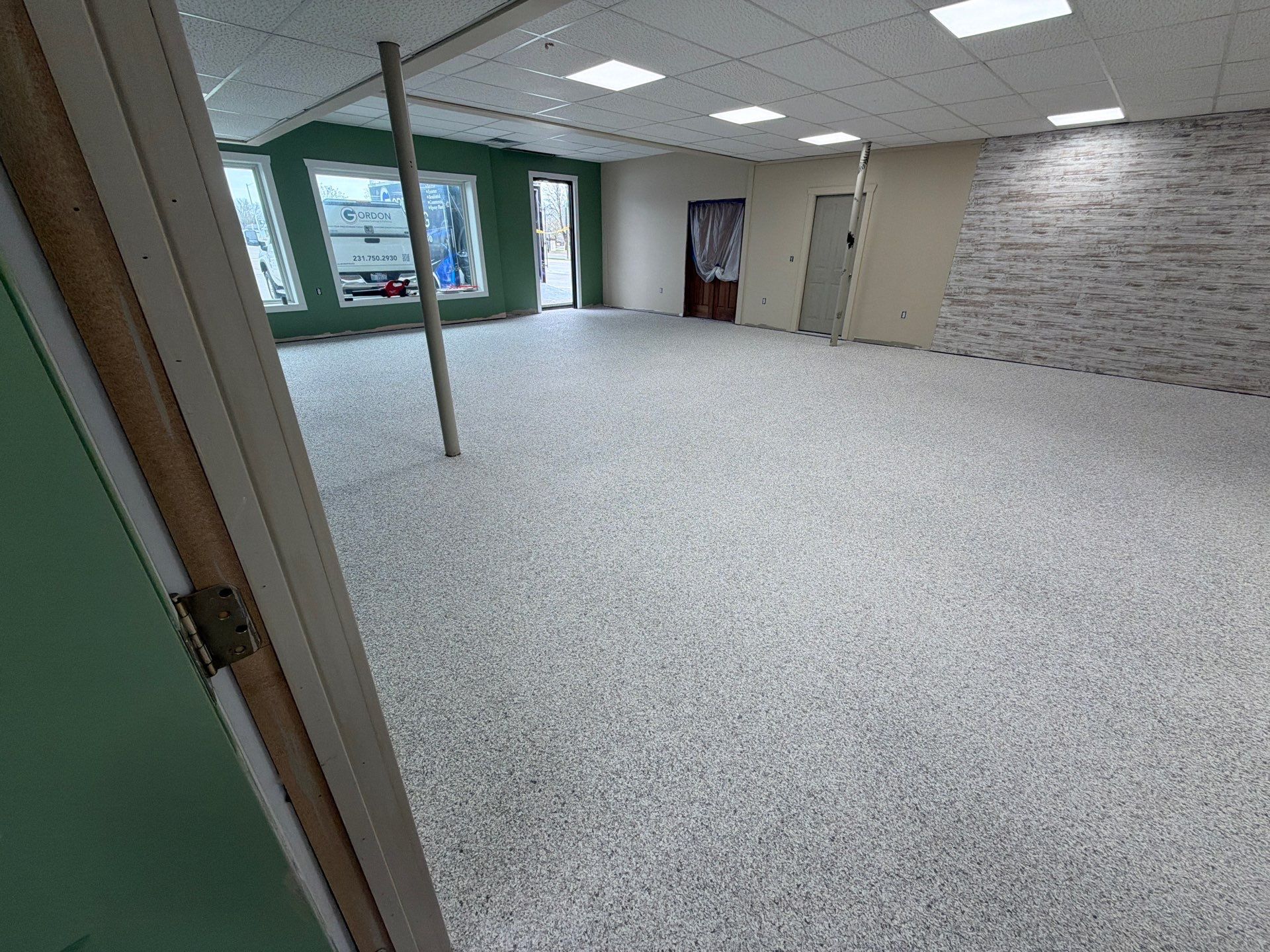 Commercial Epoxy Flake Floor Installation and Concrete Refinishing in Montague by Gordon Painting