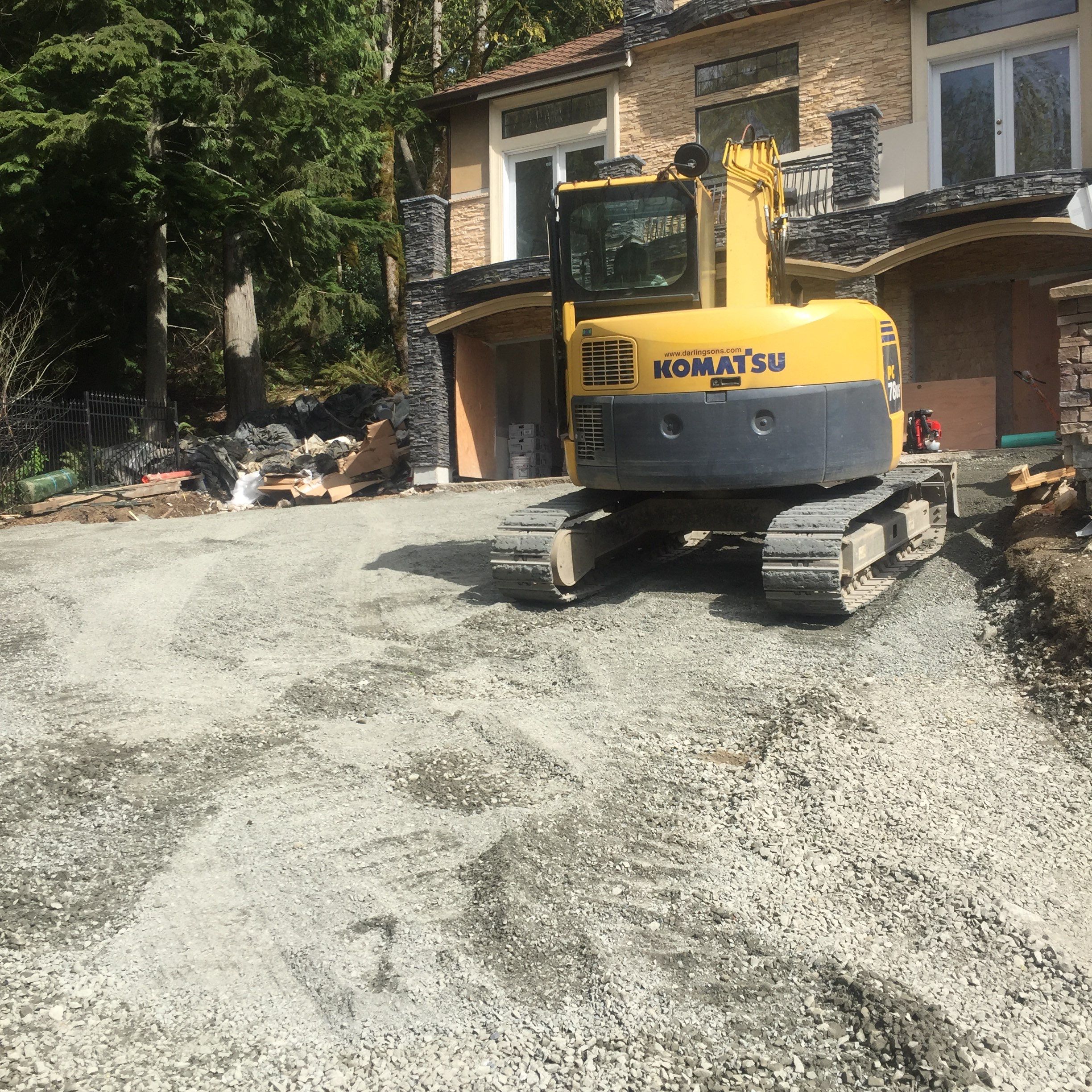 Asphalt Driveway and Stamped Concrete Patio Finish  by Jireh Asphalt & Concrete Inc 