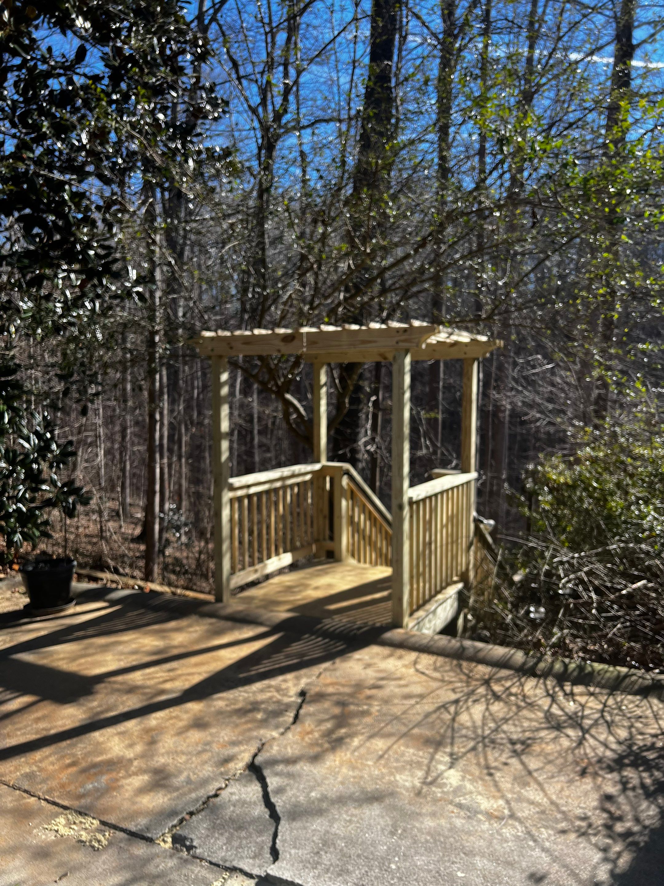 Custom Wooden Hillside Stairway Replacement with Pergola Landing in Canton by Swift Home Renovations