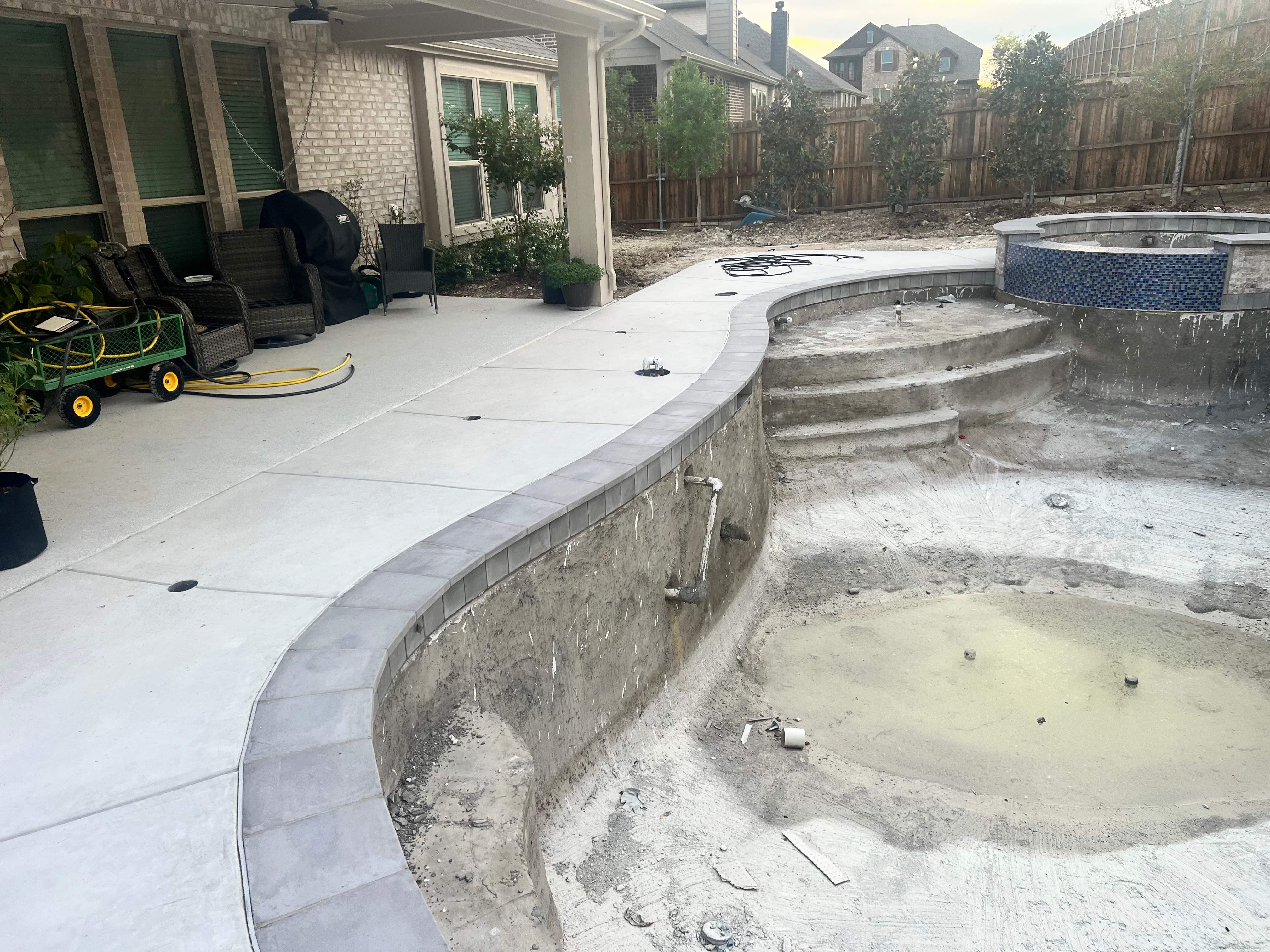 Freeform Pool with Raised Spa and Stone Coping by Pinnacle Pools and Spas - DFW