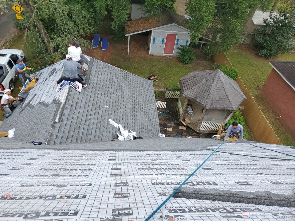 Residential Roofing Installation using Roof Replacement by American Roofing & Construction LLC