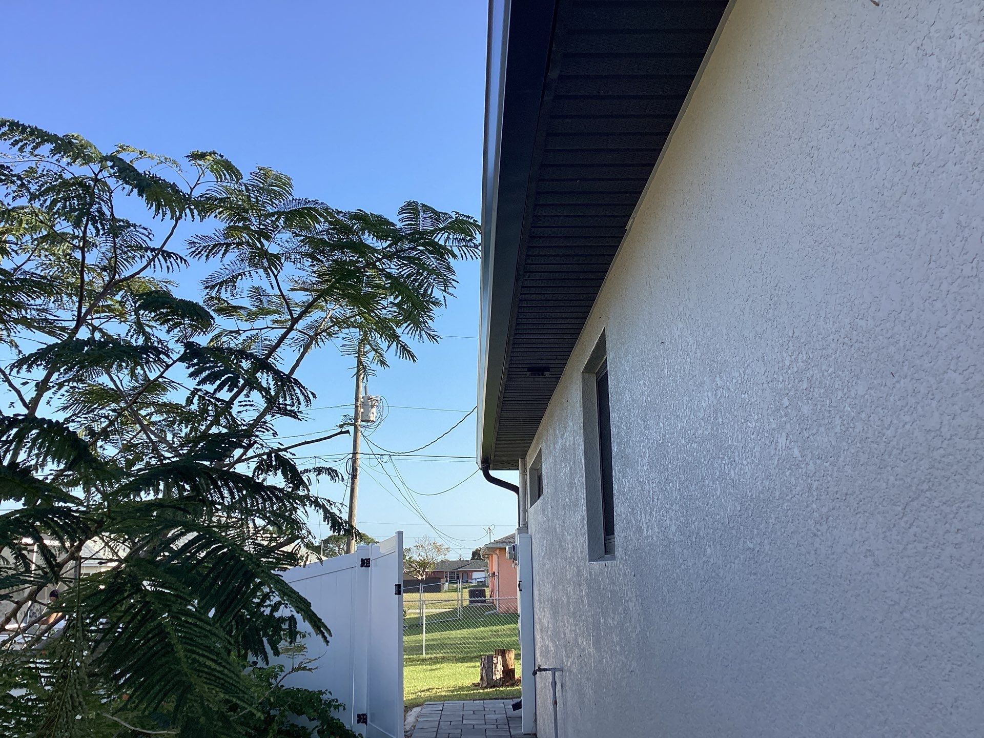Black Seamless Gutters using 6 Inch Seamless Gutters in Cape Coral FL by Gutter Professors