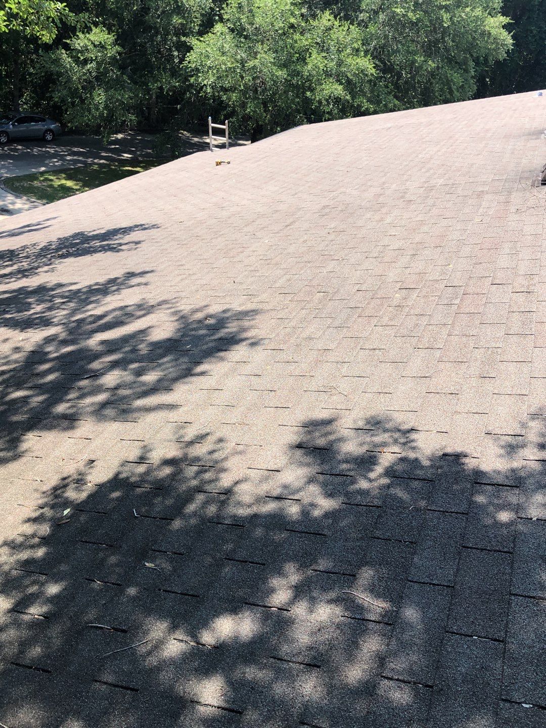 Residential Roofing Installation using Roof Replacement by American Roofing & Construction LLC