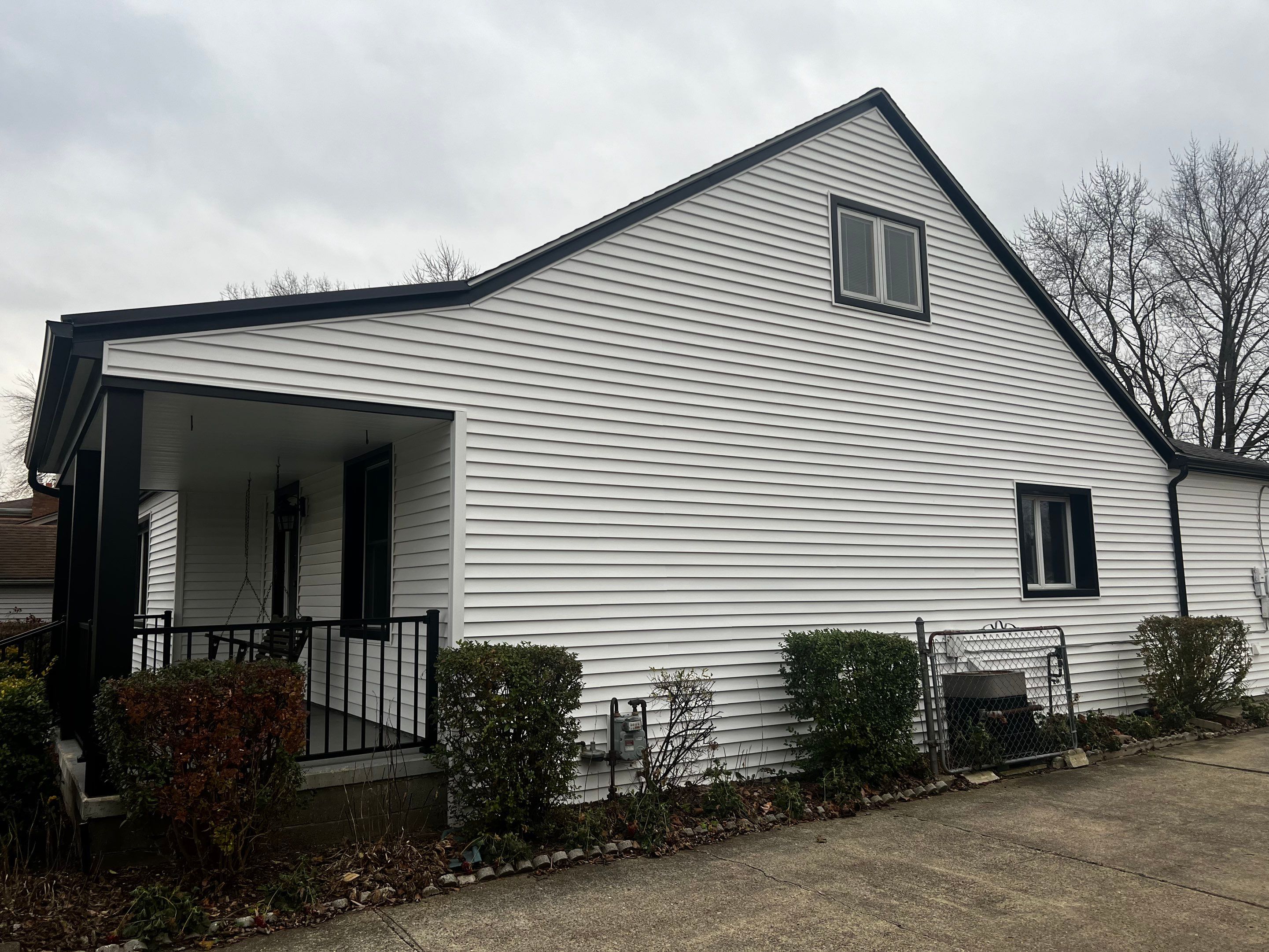 Siding Replacement using CertainTeed Monogram vinyl in Colonial White & Front Porch Remodel by Bloomfield Construction & Restoration