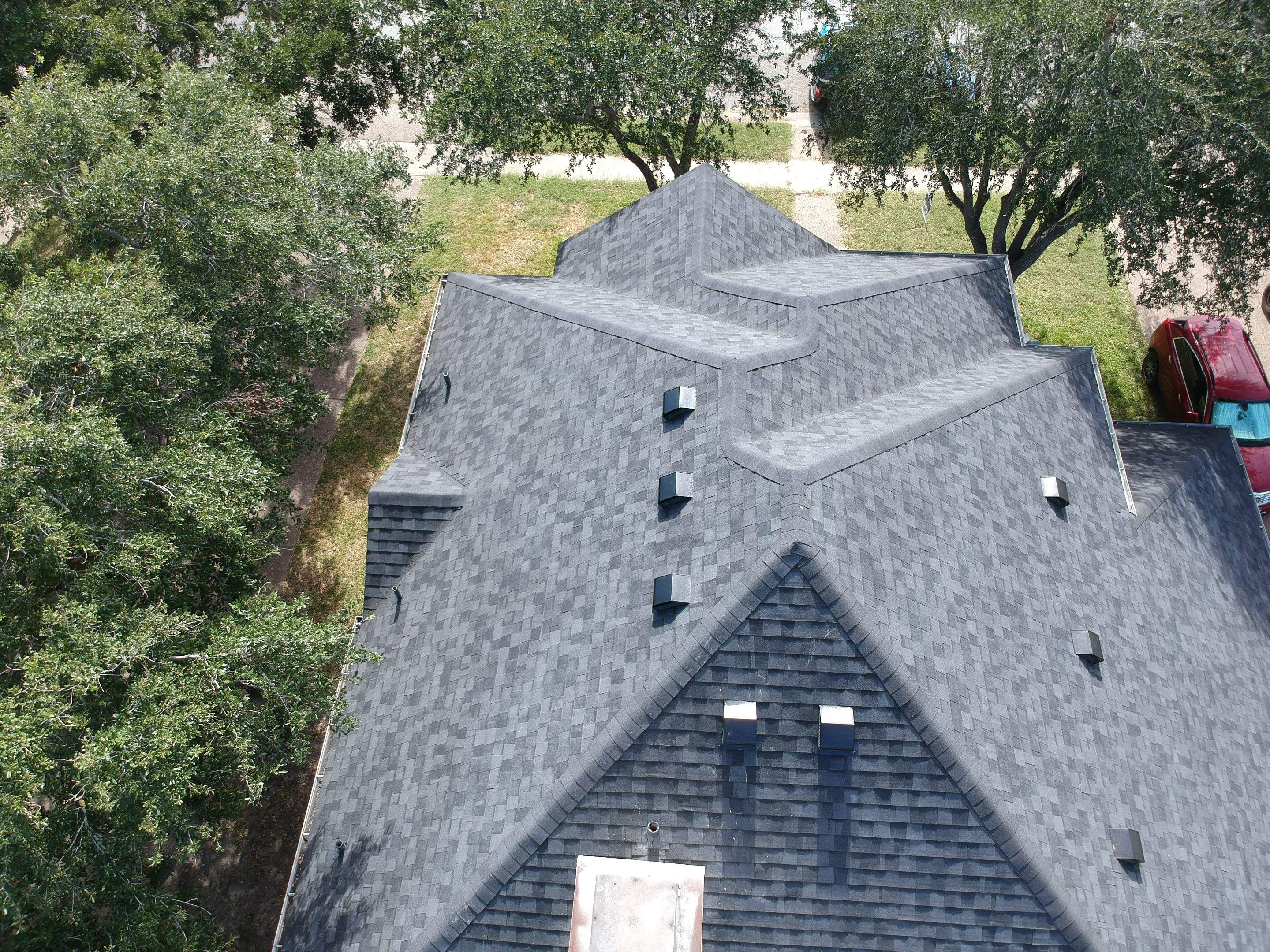 Residential Roofing Installation using Certainteed Landmark Moire Black by Galvan Roofing and Construction