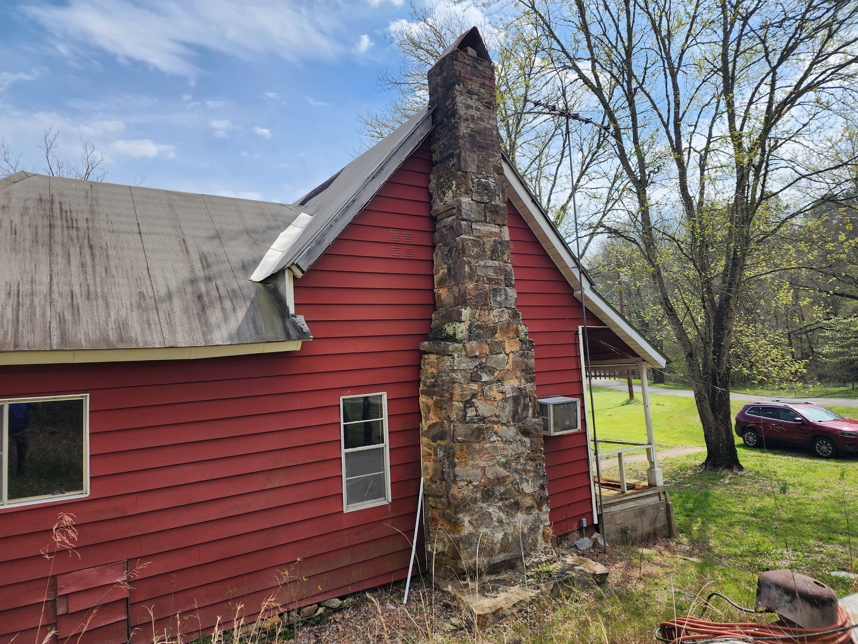Residential Roofing Installation using 26 Gauge Colored Panels by Hostetler Roofing