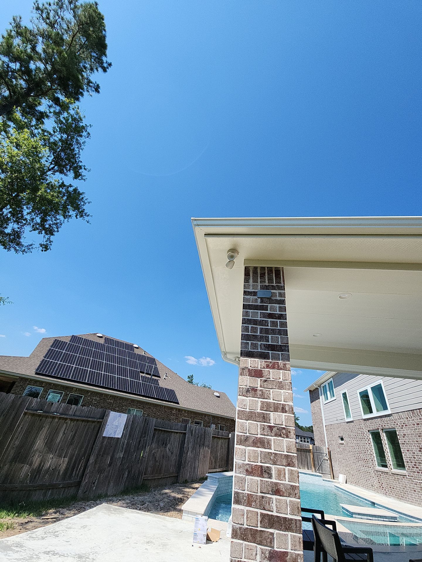 Covered patio and Summer Kitchen in Spring, TX by SophAlx LLC