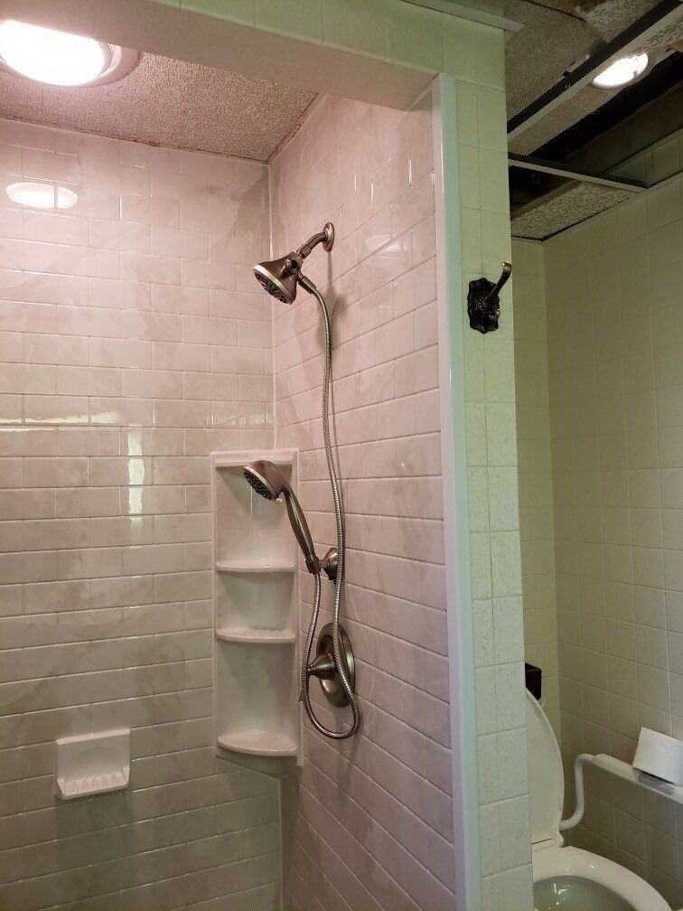 Shower Replacement using BCI Acrylic Shower System by Secure Construction Company Inc