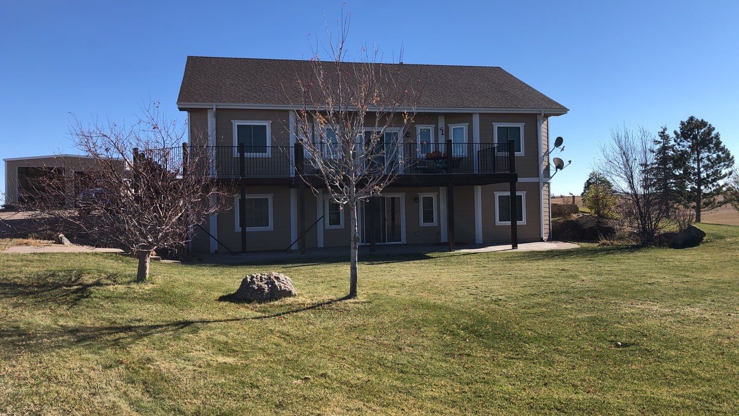 Residential Roofing Installation using Metal roofing by American Roofing & Construction LLC