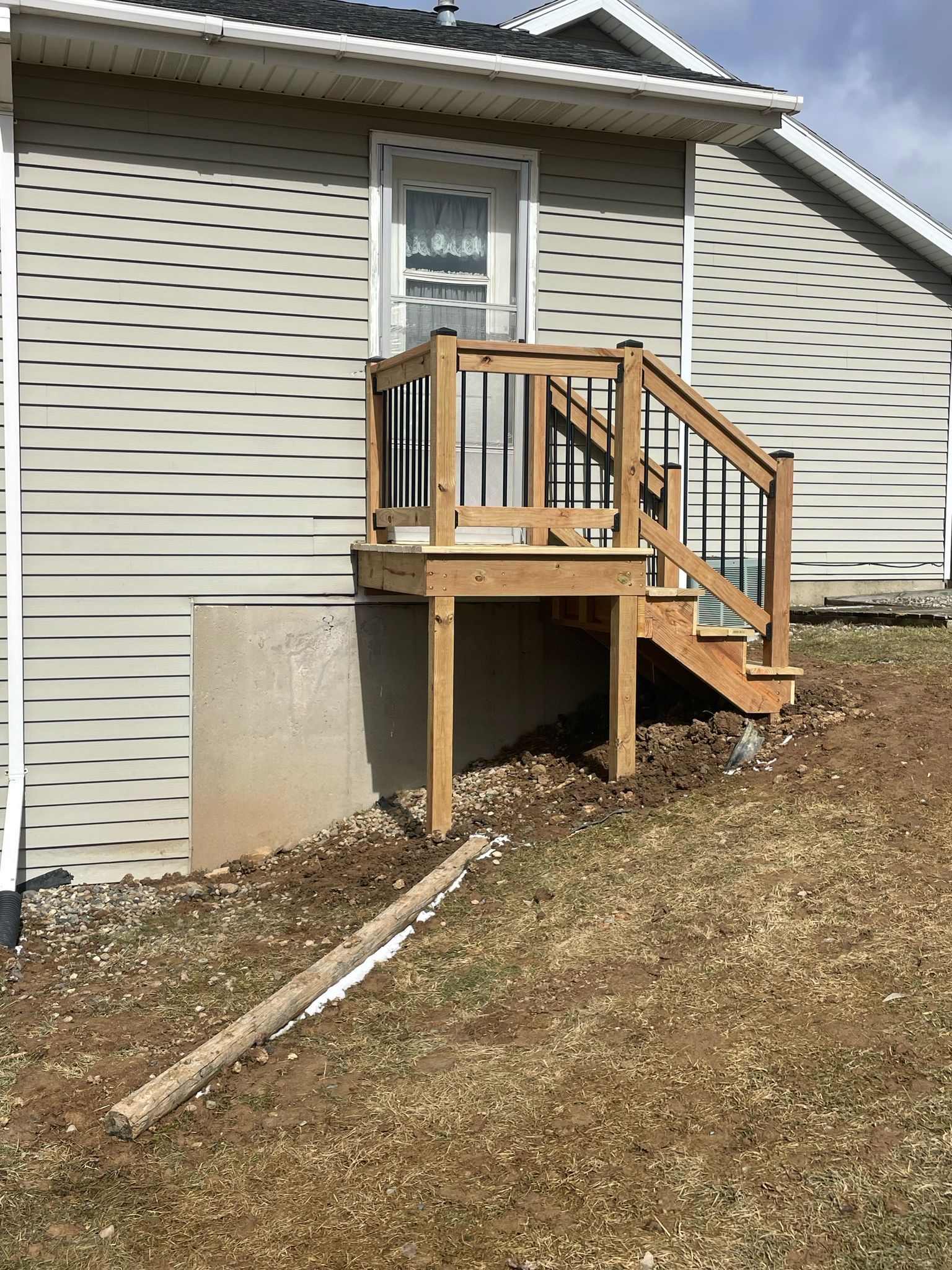 Deck Installation using Treated Lumber by Avalon Roofing and Exteriors