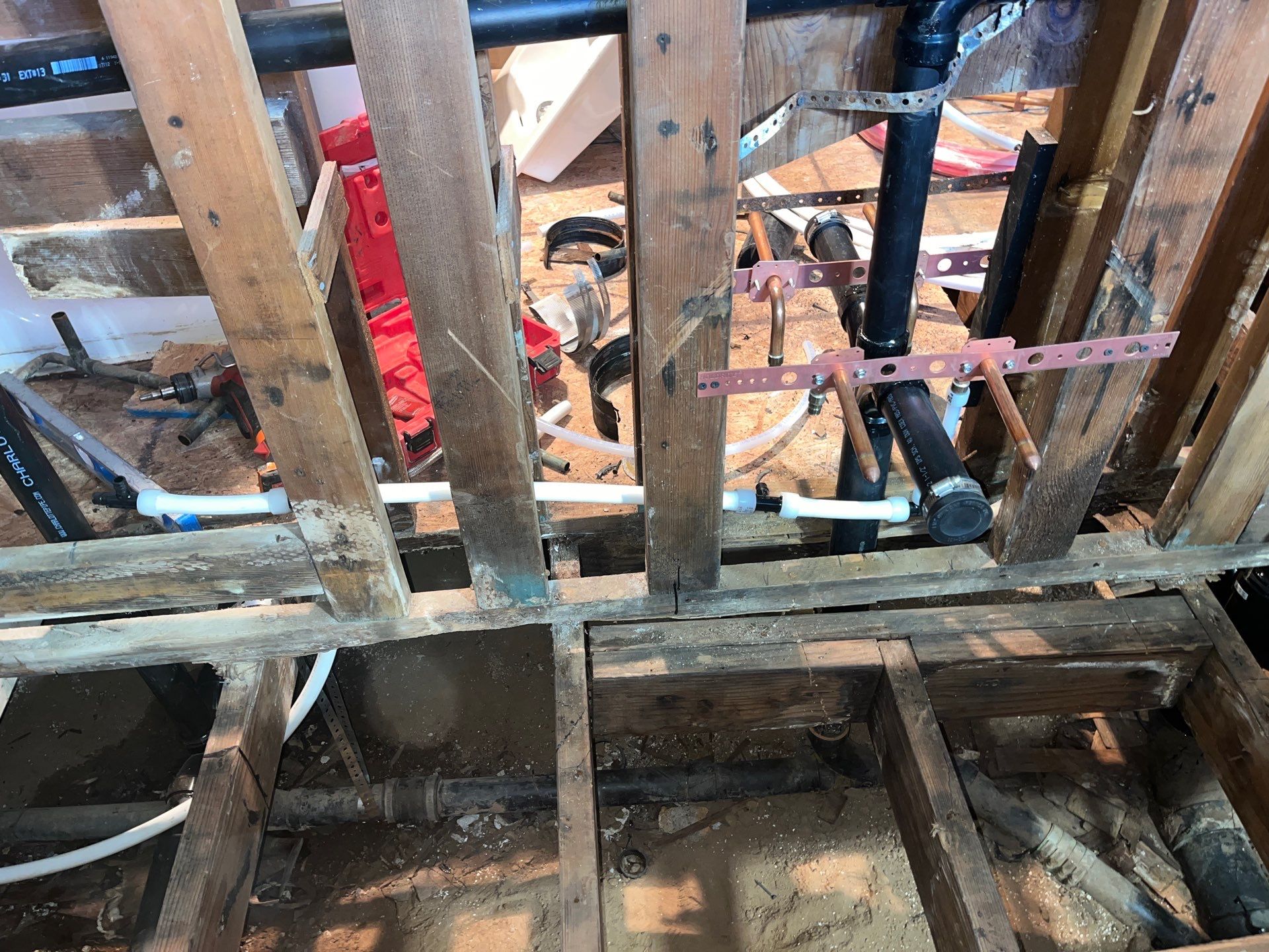 Installing New Piping and Checking Underneath Home by Us Plumbing