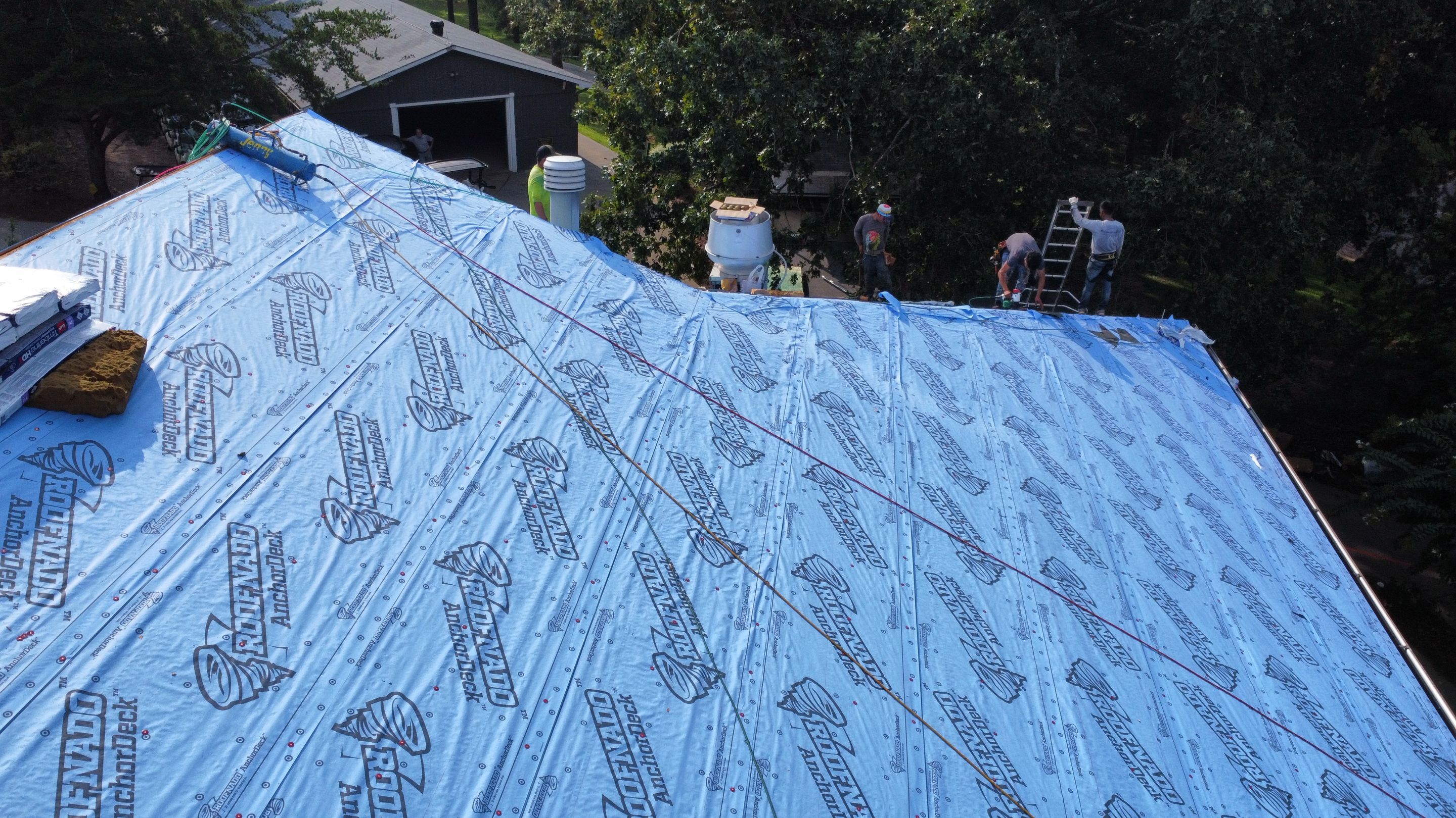 Country Club Roofing Installation by Reset Roofing