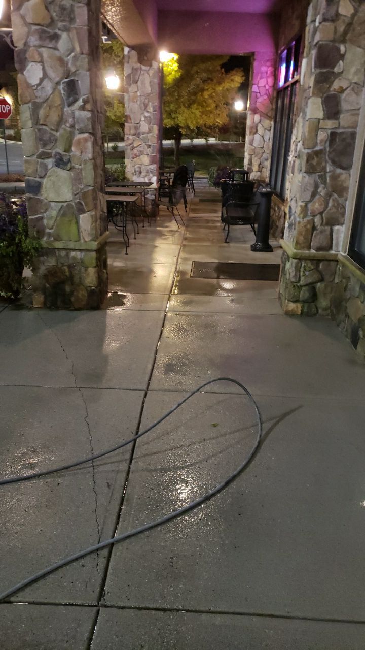 contrete cleaning using cleaner by Power Wash Masters LLC