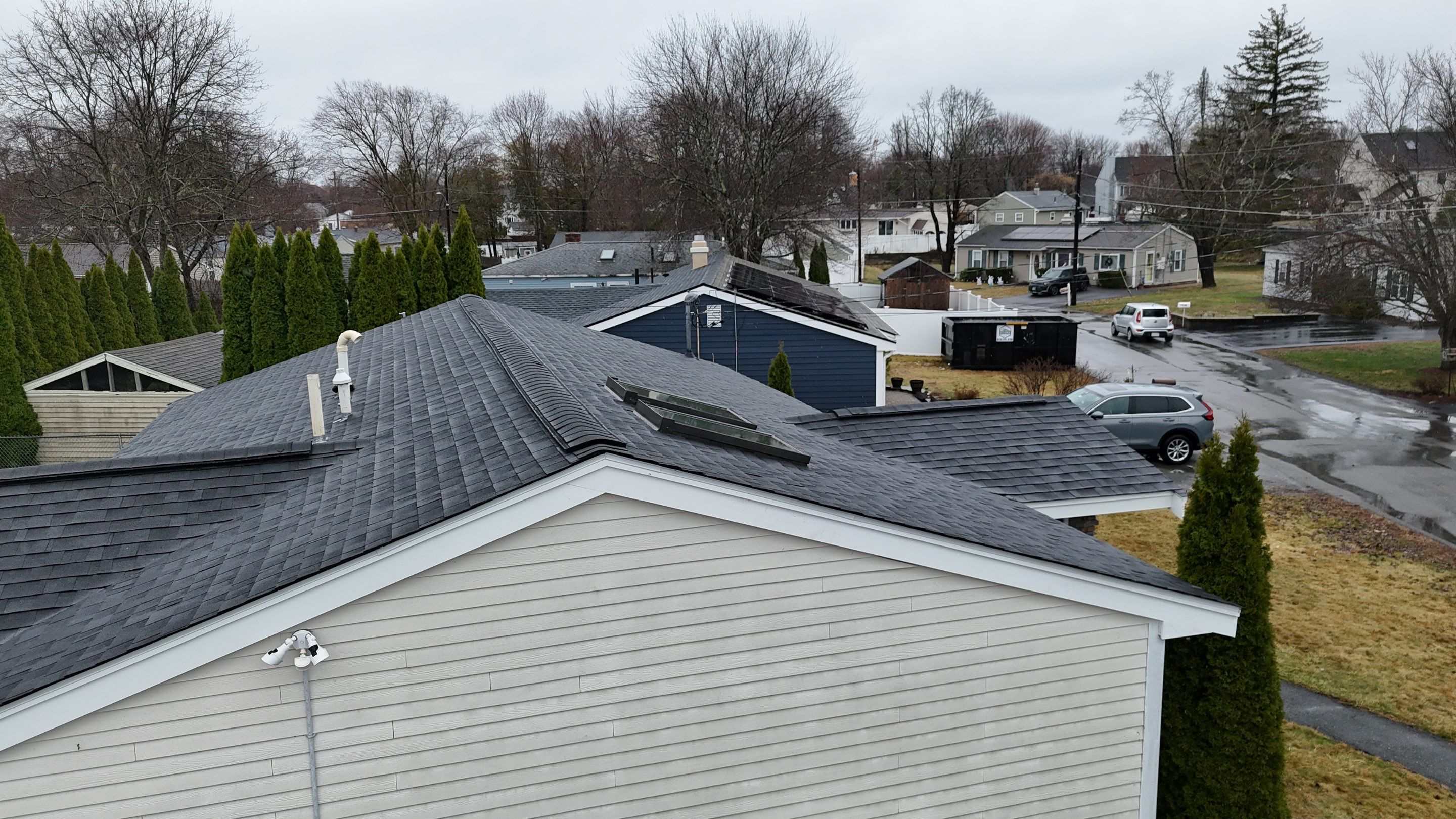 Full Roof Replacement & Complete PVC Trim System in Lowell, MA by Mighty Dog Roofing of Greater Middlesex County