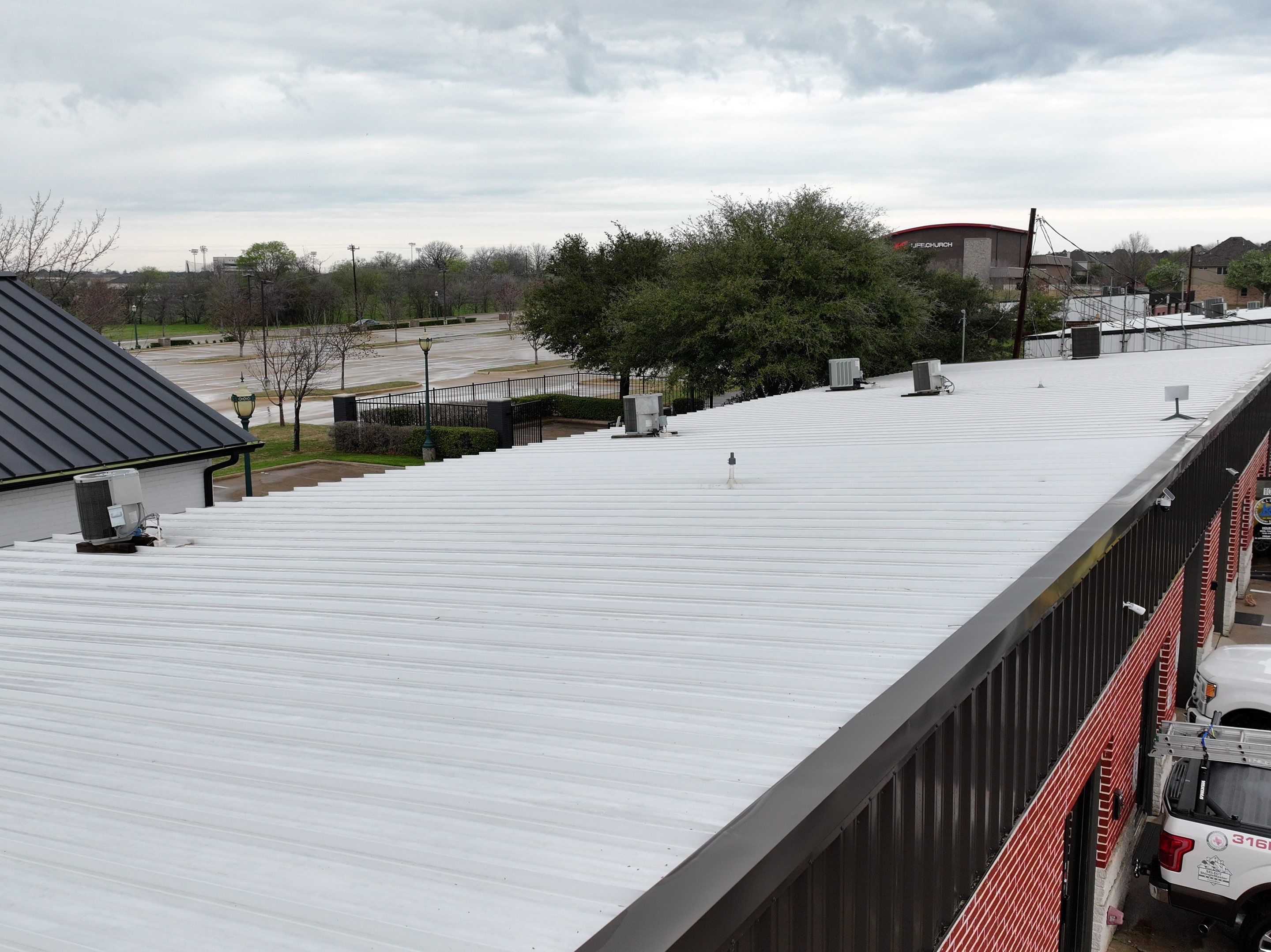 Commercial Roofing Installation using Double lock Mechanical Standing Seam Metal by Becker Roofing and Exteriors