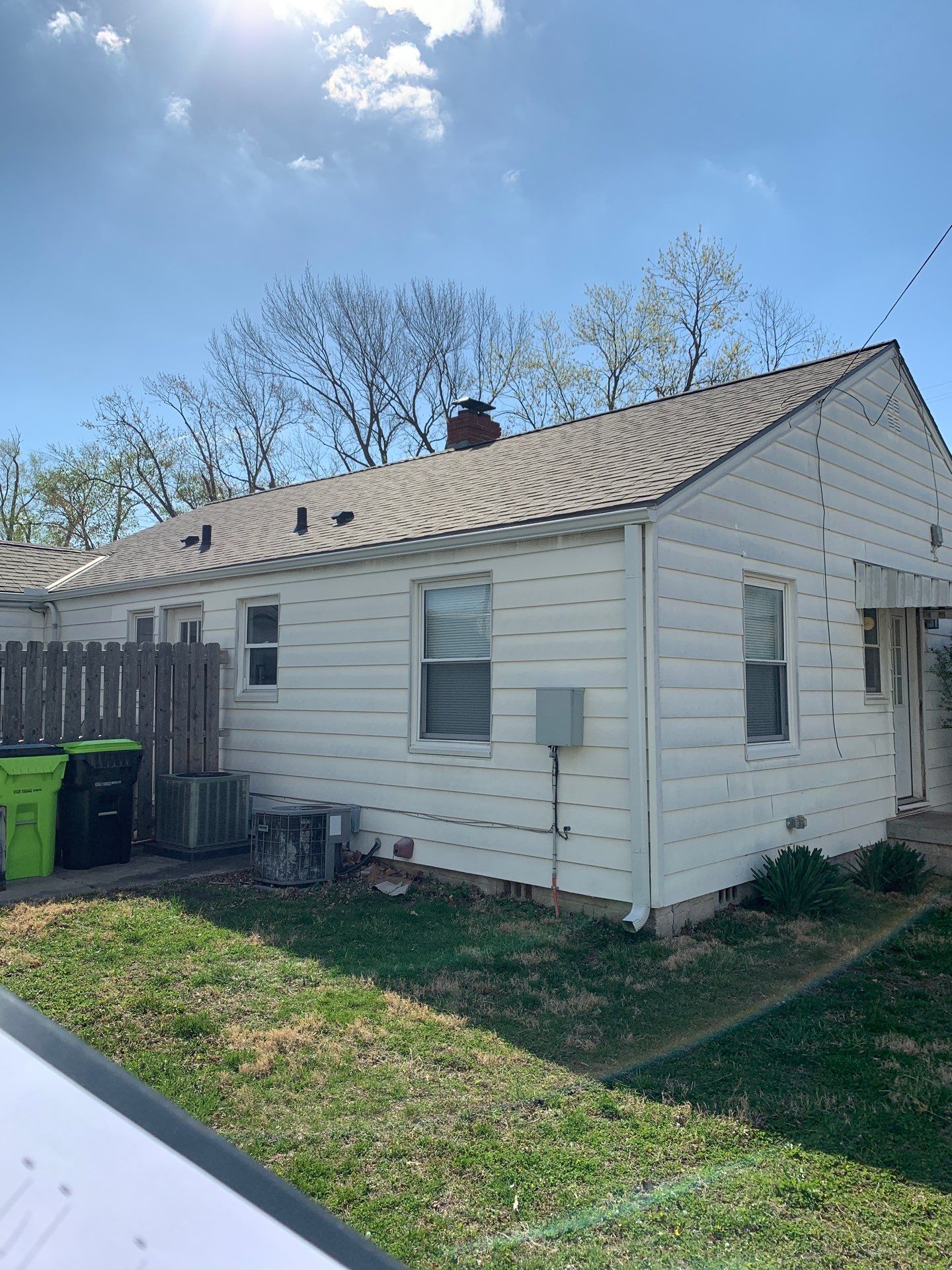 New Cypress Siding going on this North Kansas City Home  by EEC  Windows, Siding & Roofing 