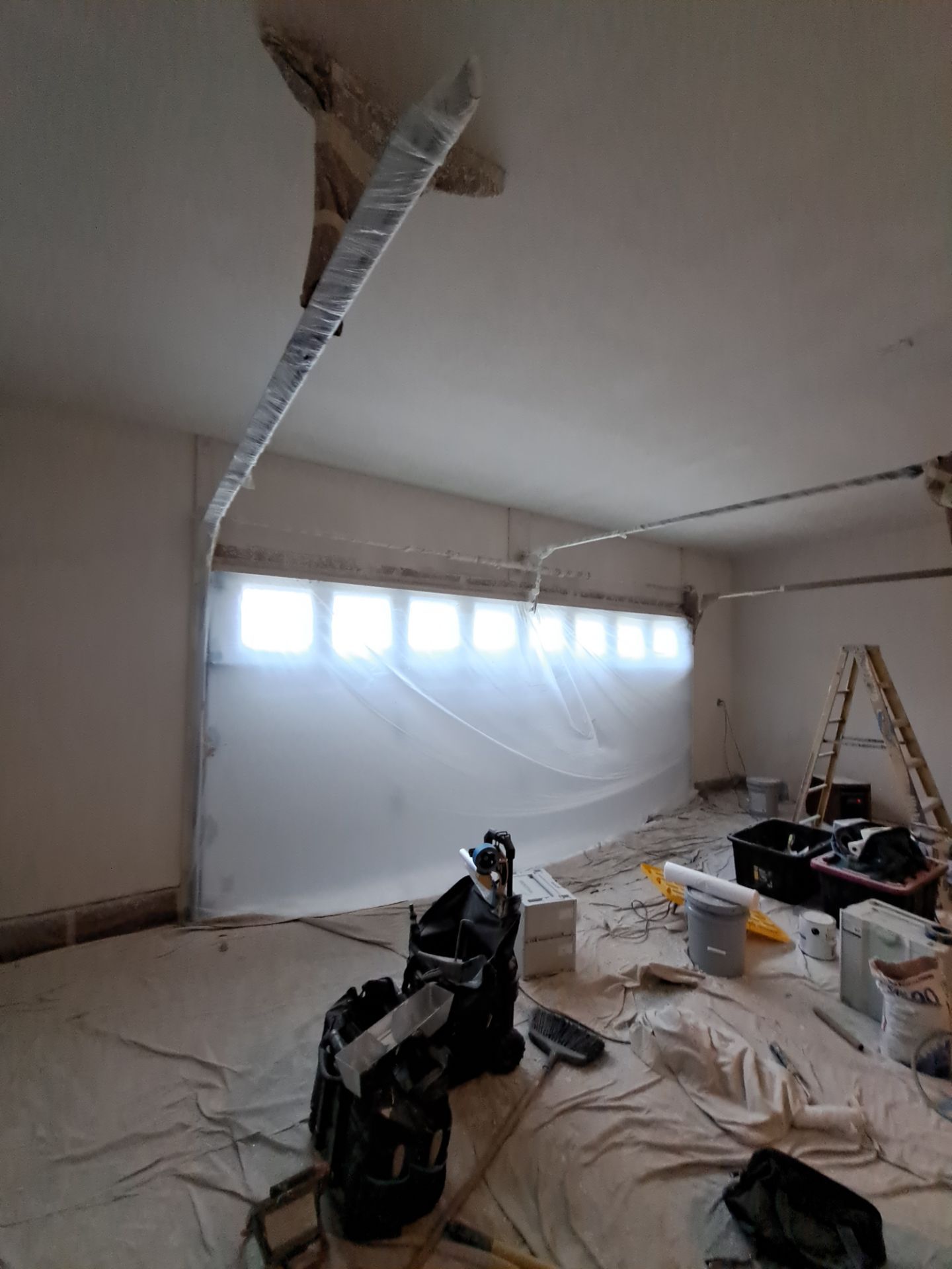 Garage dry wall repair/ re-texture, re-paint by Gordon Painting
