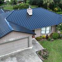 24ga 1.5" Mechanical Seam Matte Black by Total Roofing System The Metal Roof Experts
