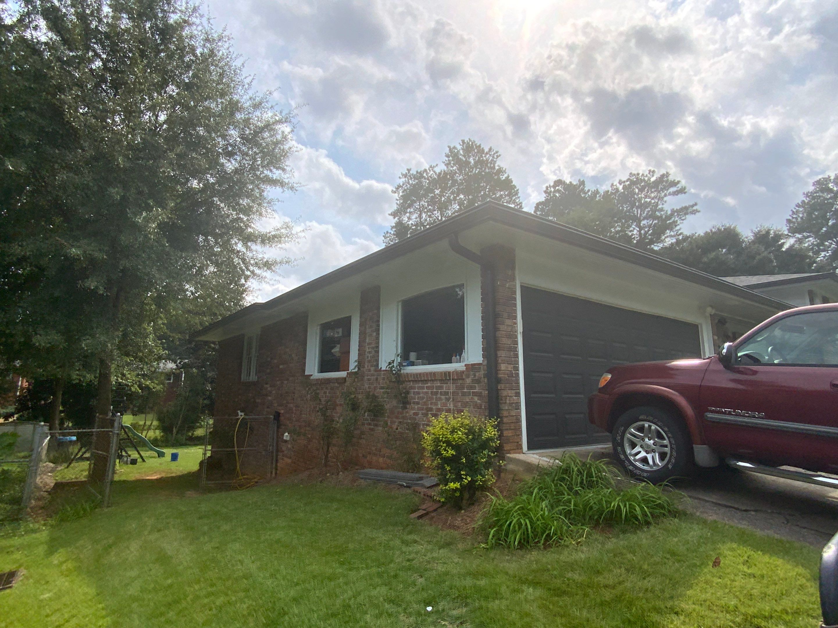 Full Exterior Trim Painting and Multi-Level Deck Staining by Swift Home Renovations