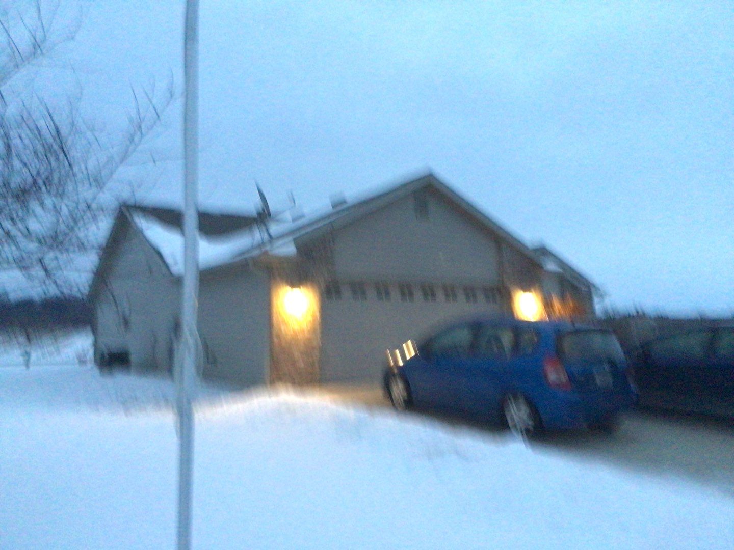 Burgundy Exposed Fastener Metal Roof in Columbia City, Indiana Country Home by 4Ever Metal Roofing