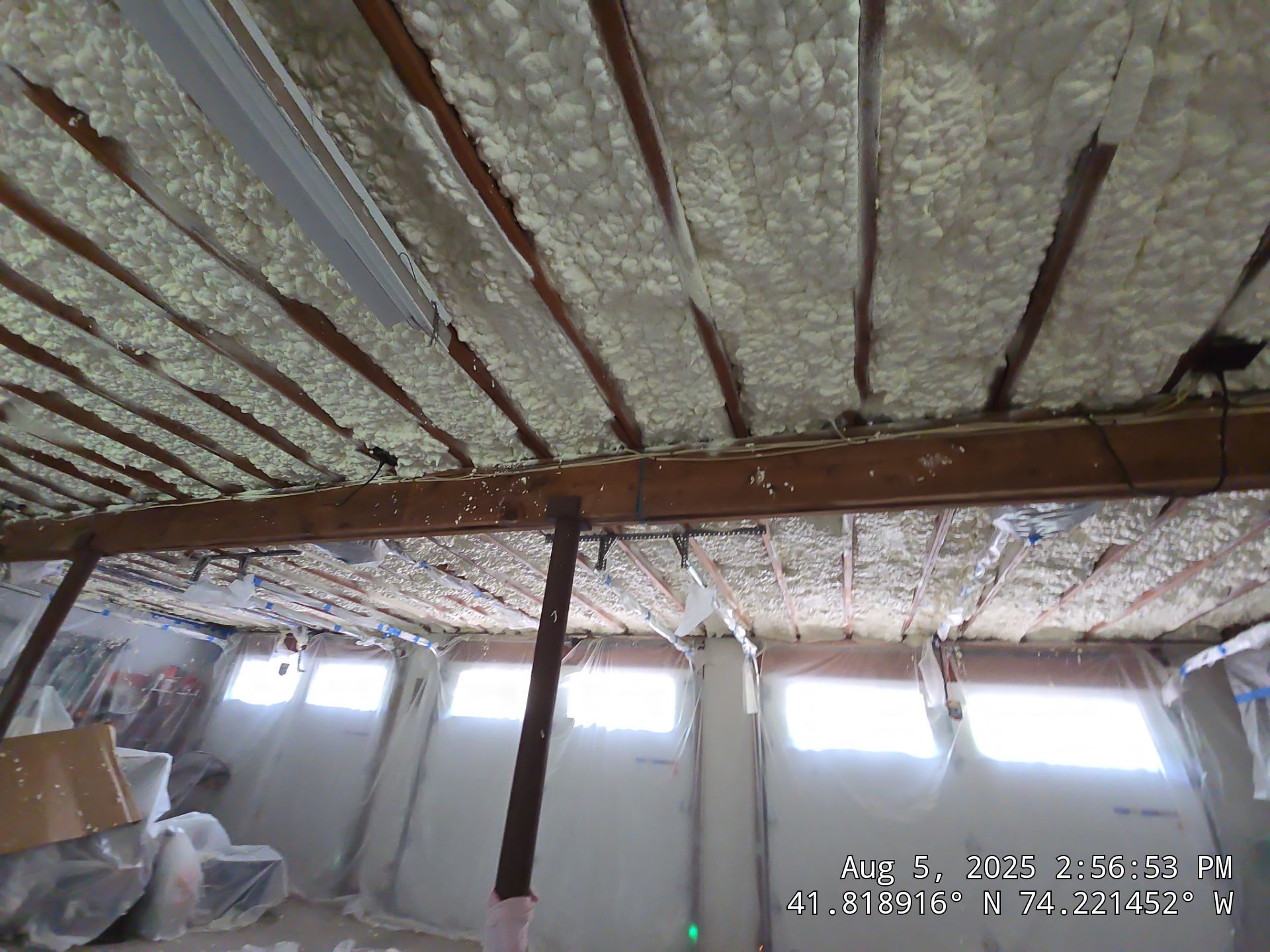 Master bedroom Exterior Walls using open cell spray foam by NYS Foam & Energy