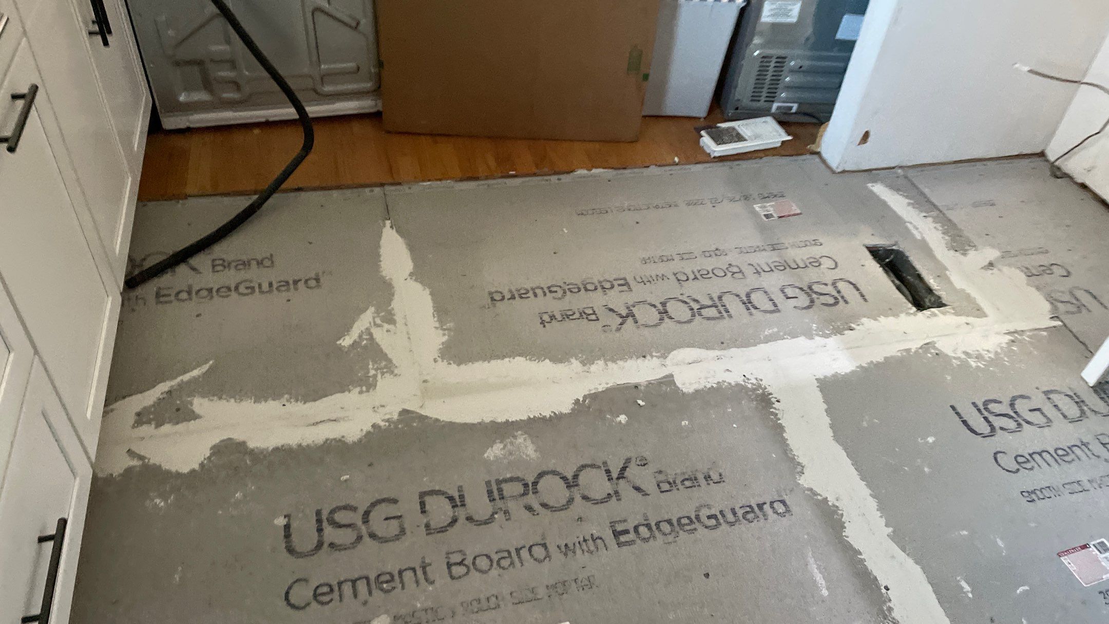 Kitchen Backsplash and Herringbone Tile Floor Remodel by Footprints Floors of Coastal Carolina