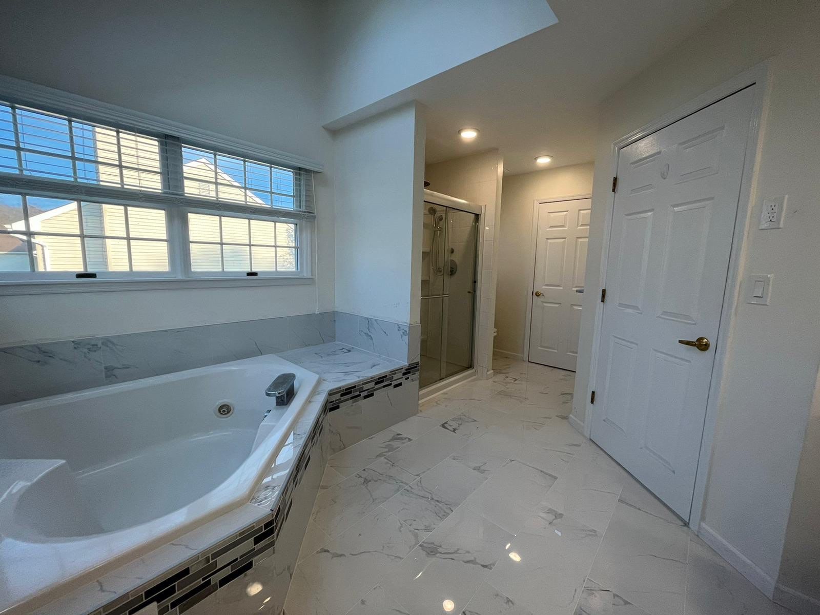 Bathroom Remodel using Tile by Home Concepts Construction