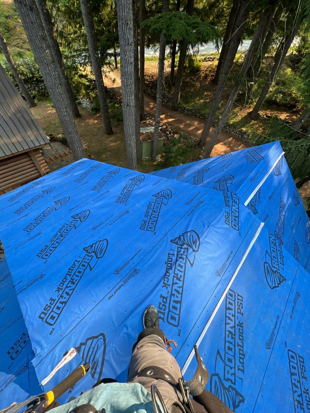 Residential ReRoofing Installation using 12" Prolok metal  by Top Notch Roofing Inc